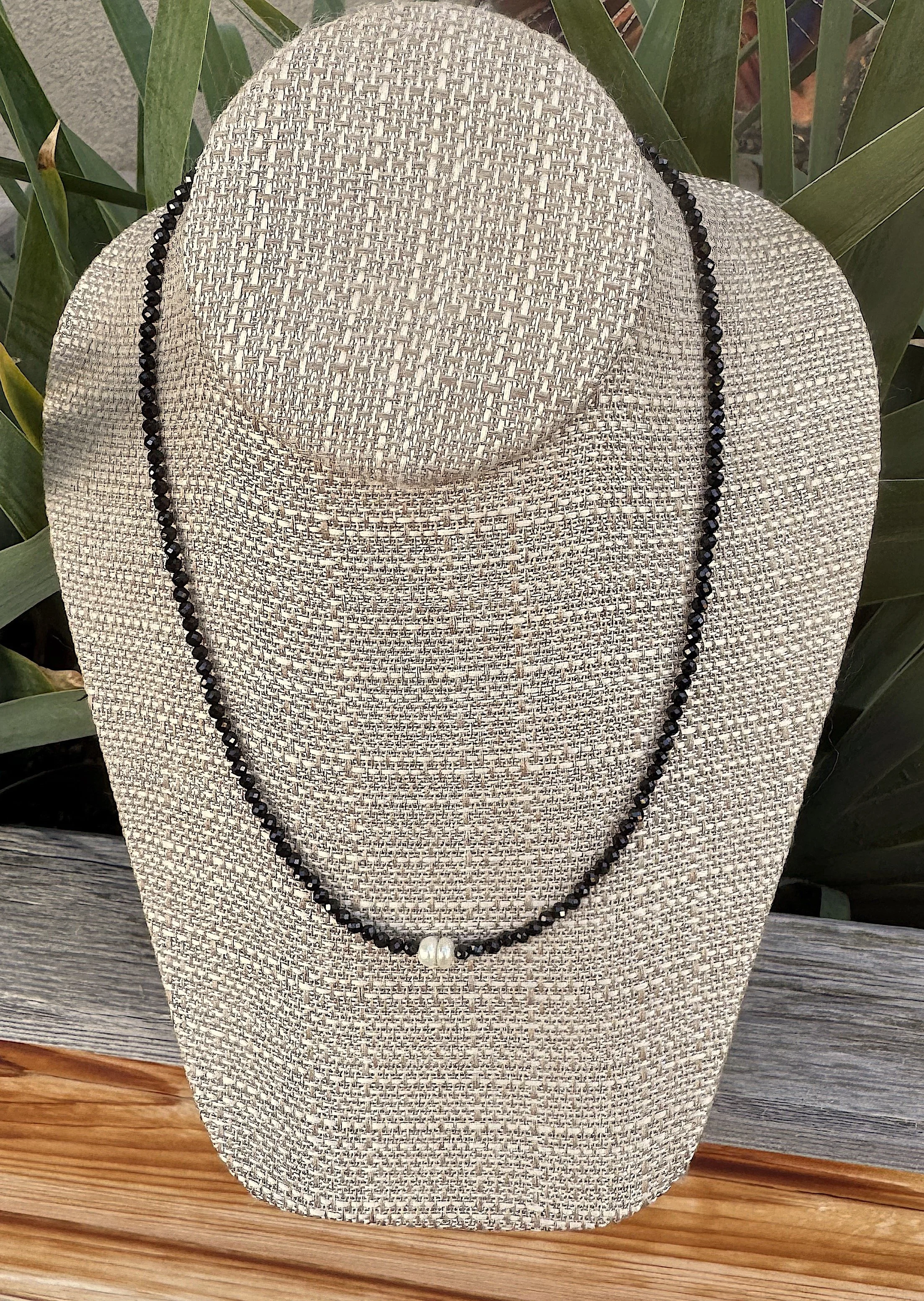 Two Pearls-Faceted Blck Spinel irises.jpeg