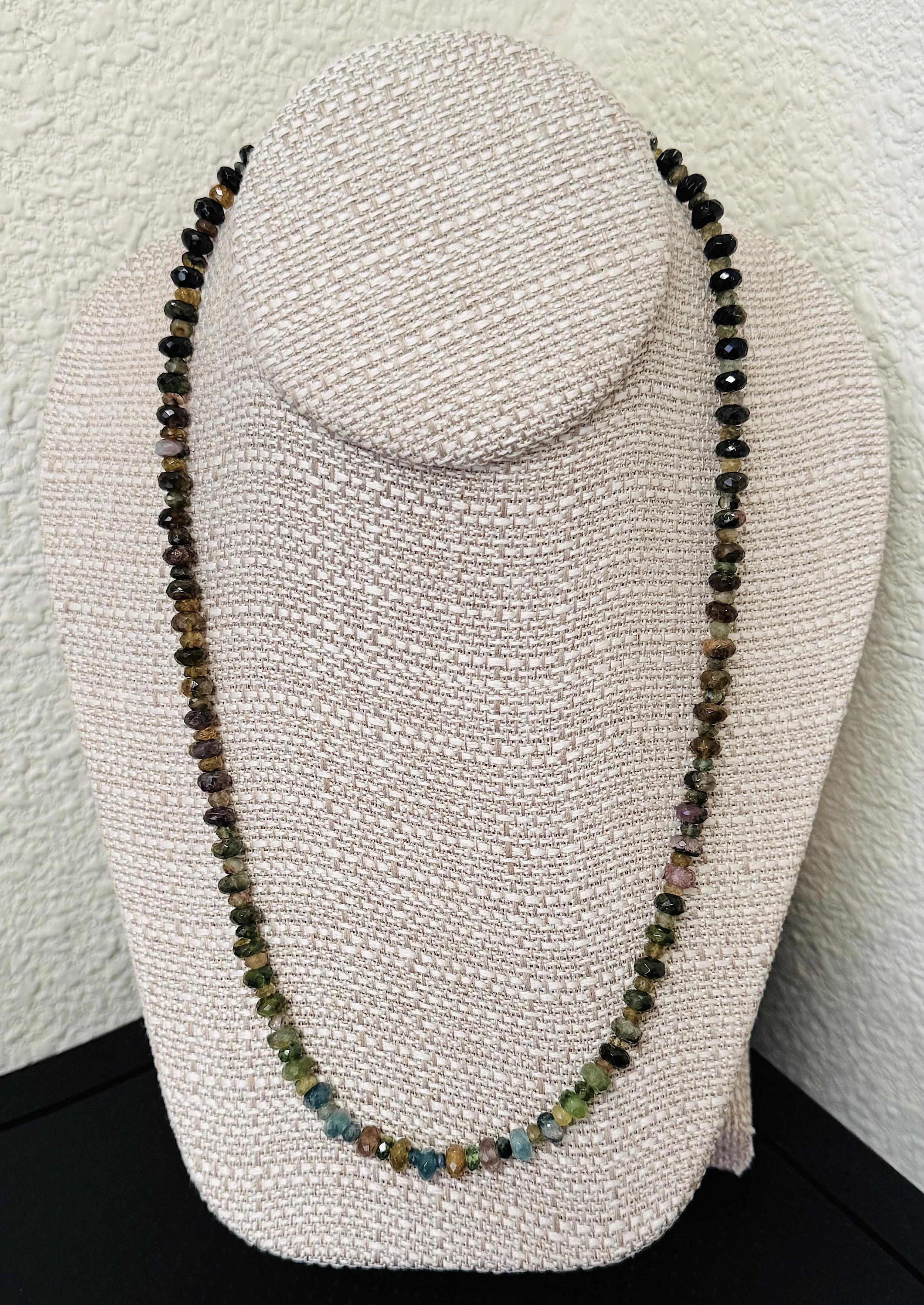 Mixed Tourmaline on stand.jpg