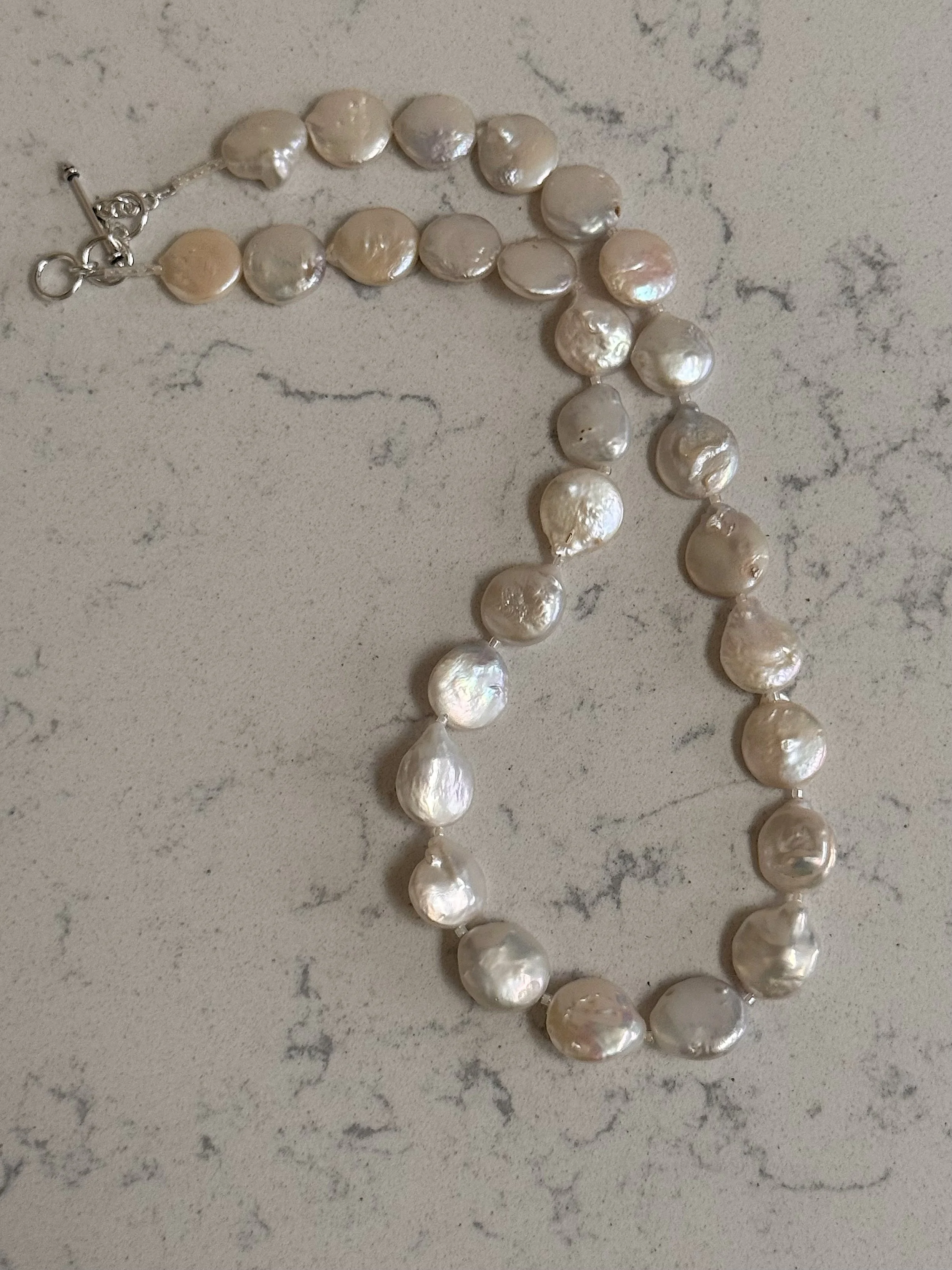 Coin Pearls curved.jpeg