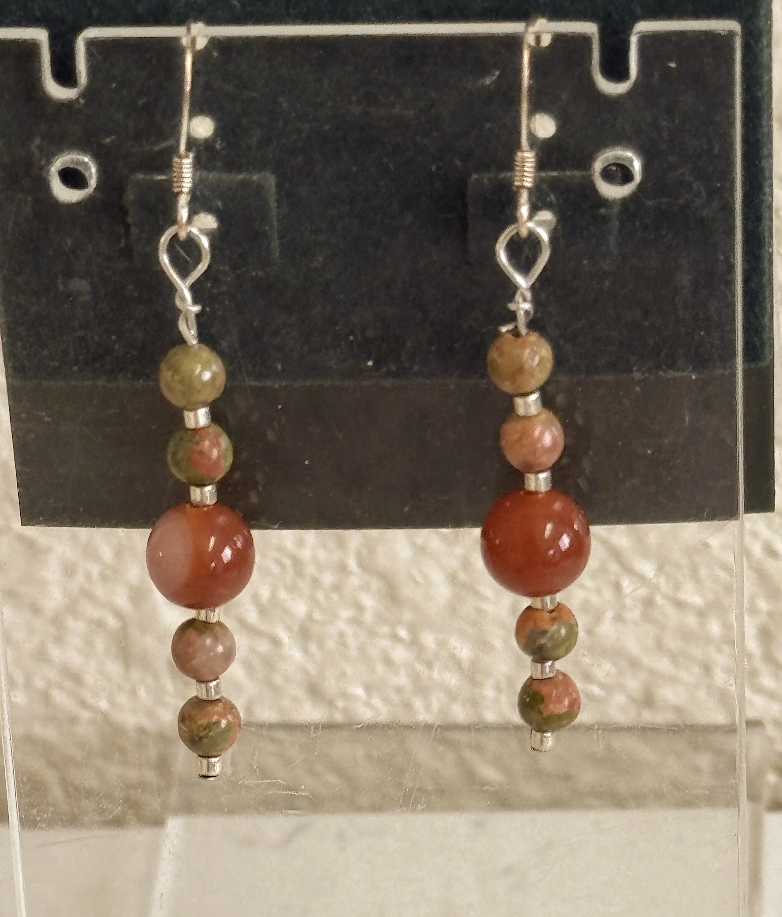 Unakite and Red Agate earrings on stand.jpeg