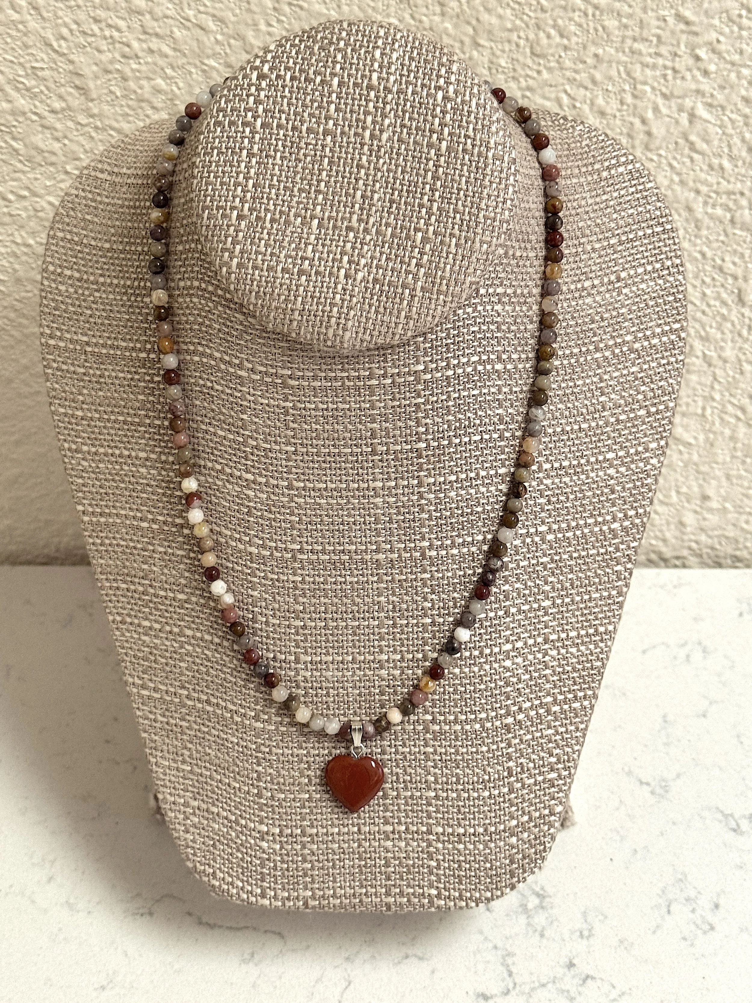 Bamboo Agate and Red Jasper heart on stand.jpeg