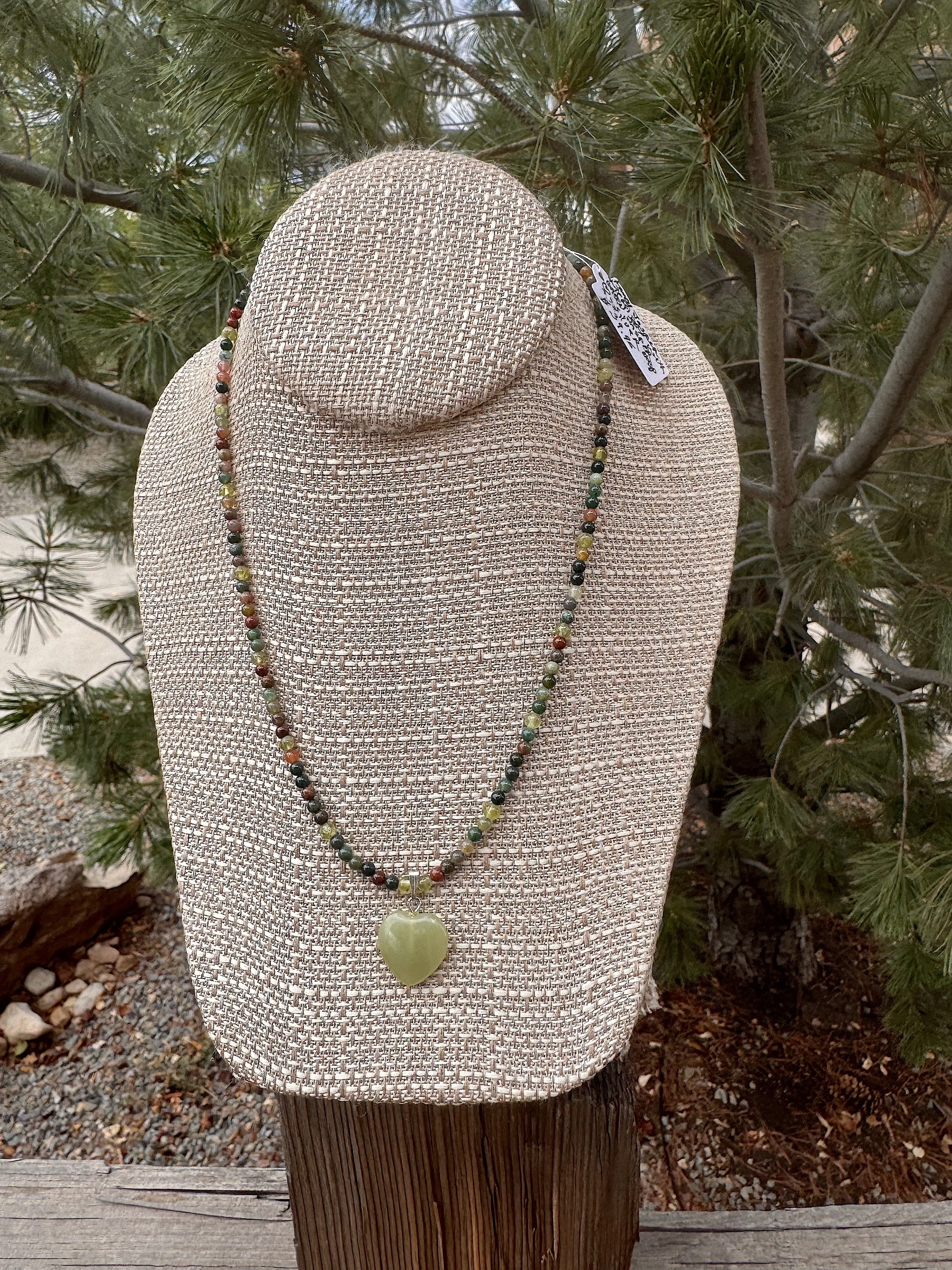 Fancy jasper and Peridot with Green Heart pine.jpeg