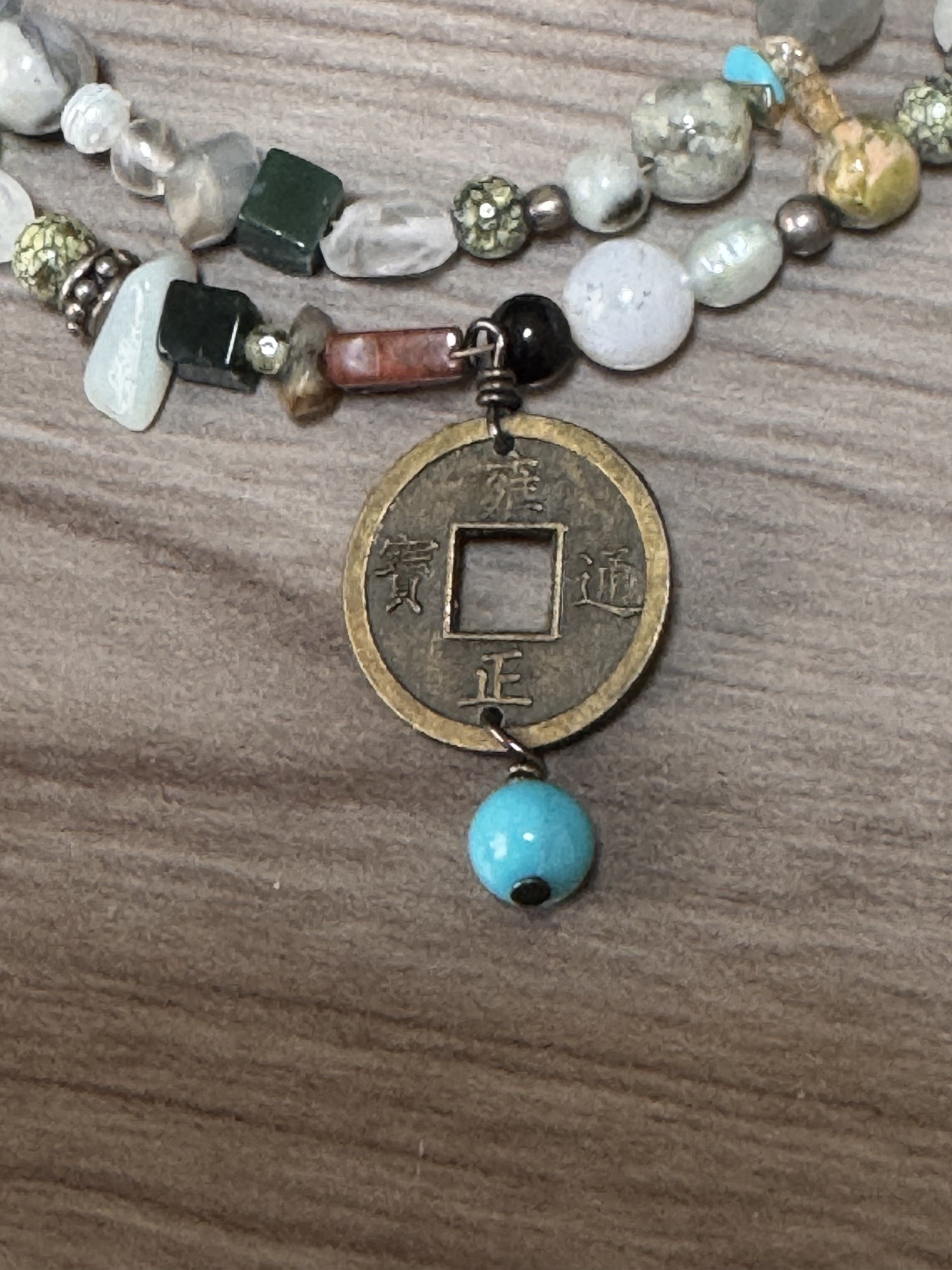 Everything Antique coin bracelet closeup.jpeg