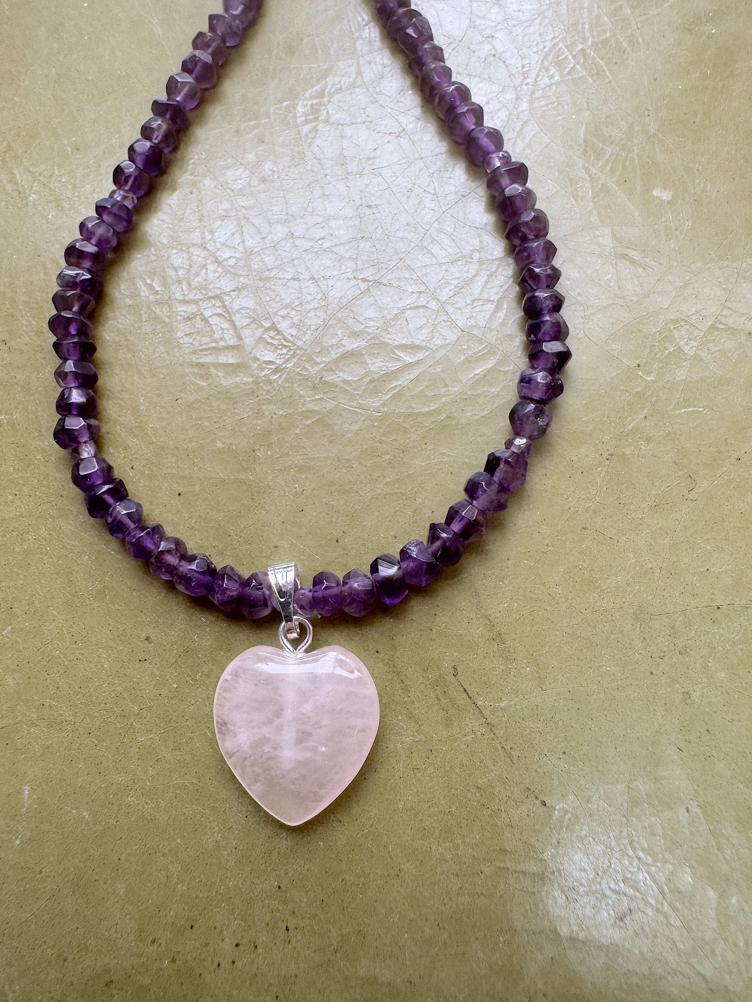 Amethyst with Rose Quartz Heart closeup.jpeg