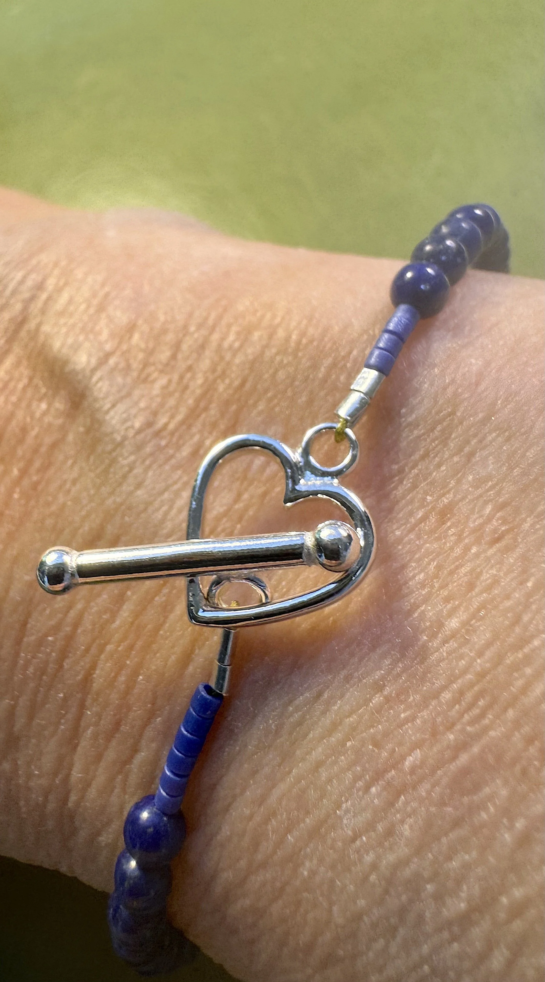 Lapis and Blue Chalcedony bracelet heart clasp on me.jpeg