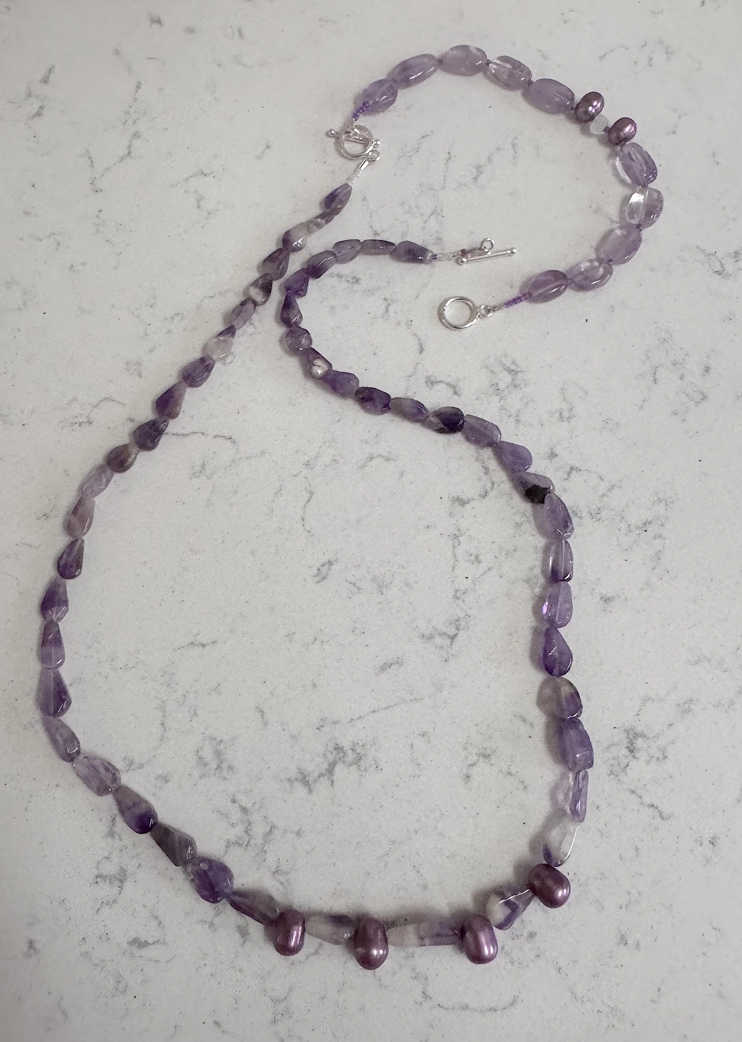 Purple Flowers and bracelet 1.jpeg
