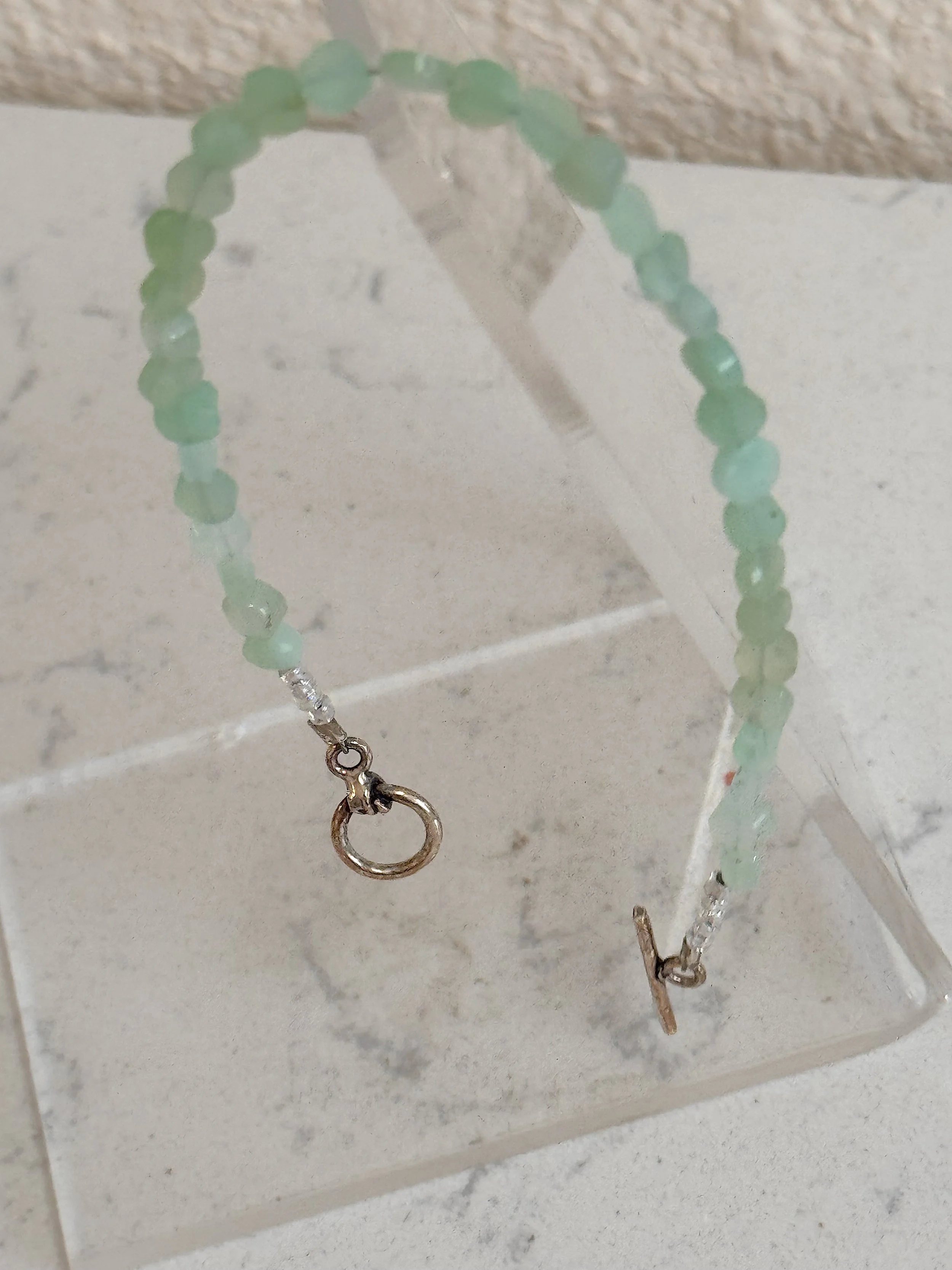 Chrysoprase bracelet on stand.jpeg