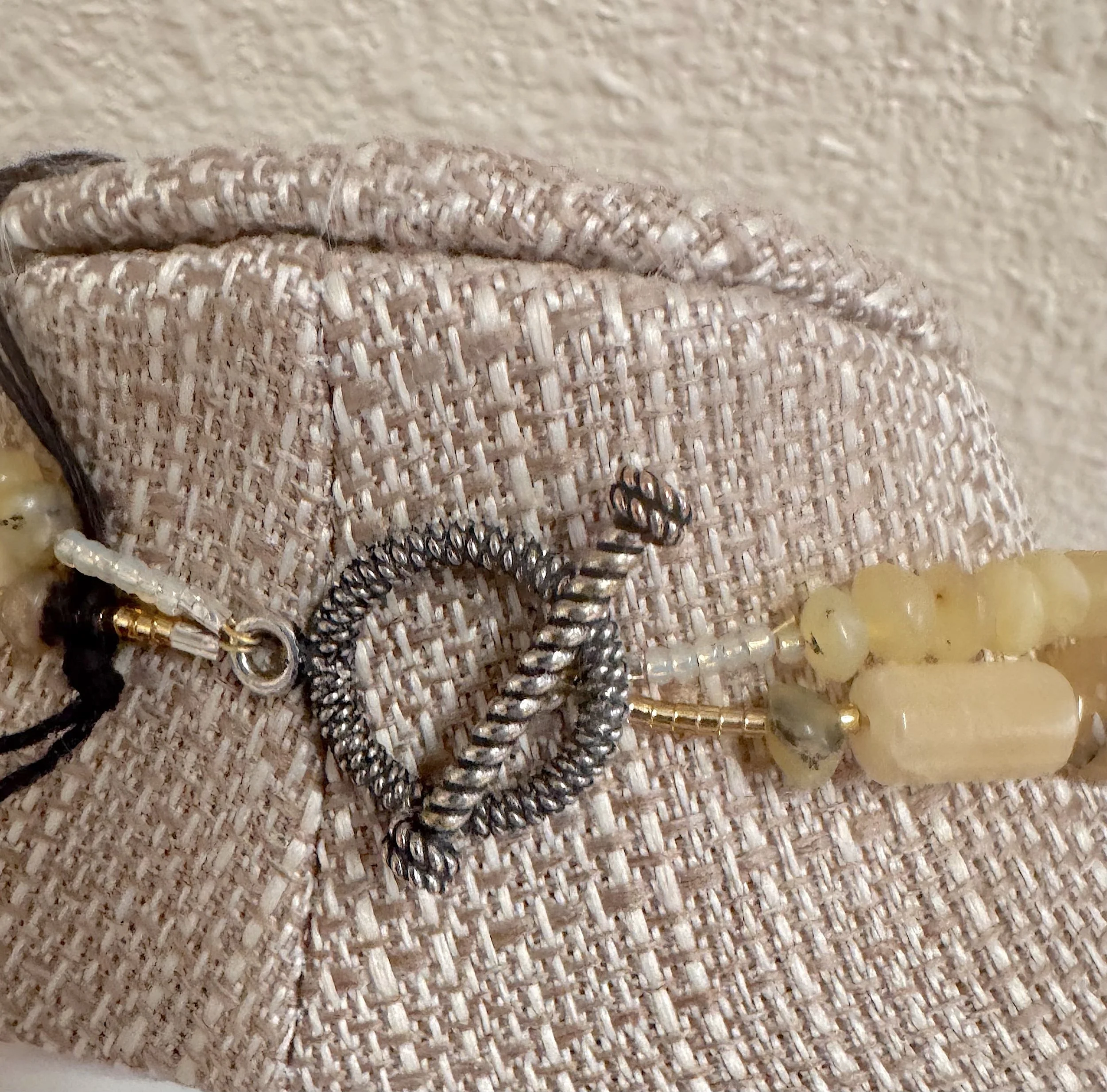 Honey Pot clasp closeup on stand.jpeg