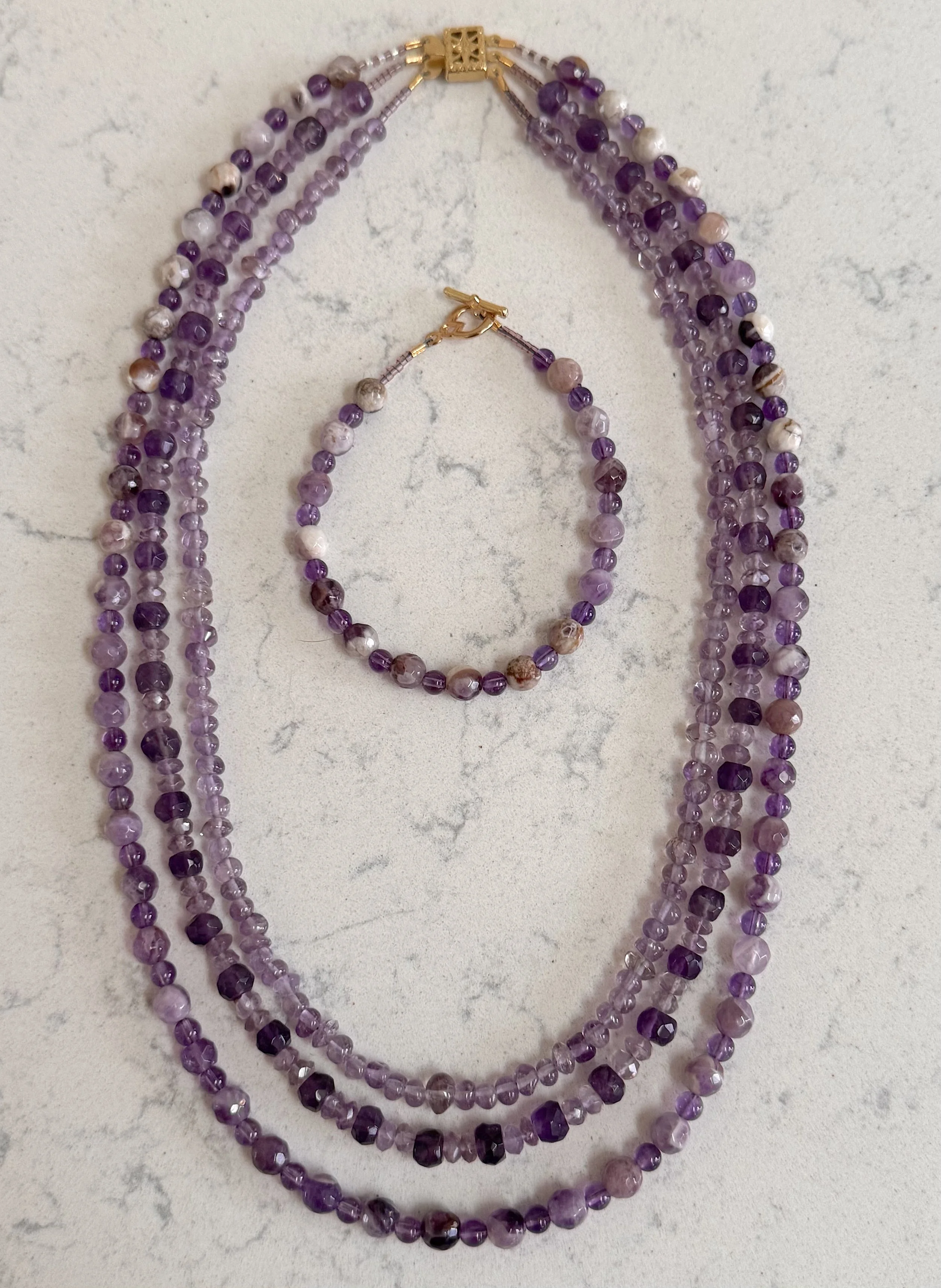 Lavender Amethyst set on quartz.jpeg