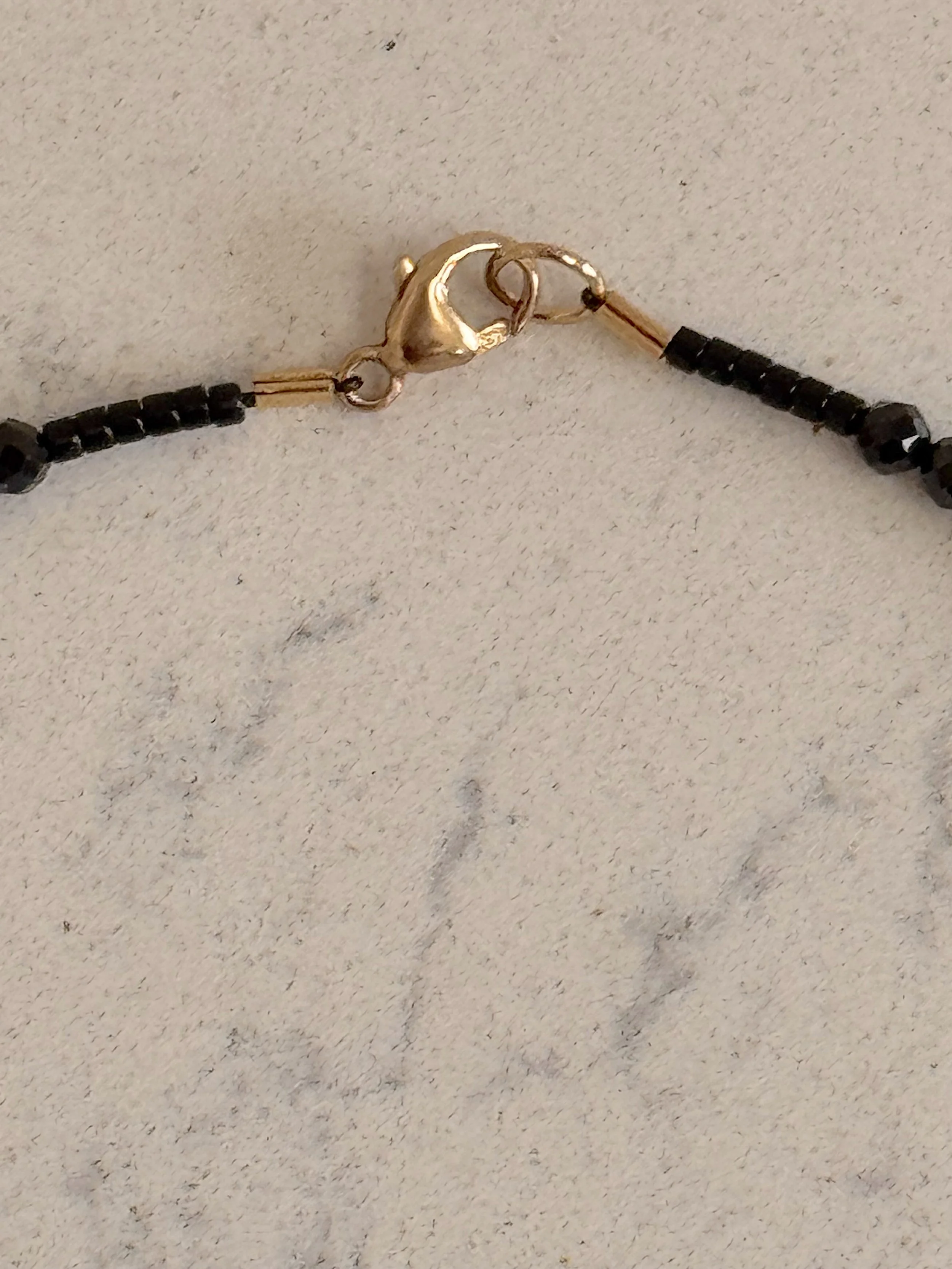 Two Pearls-Faceted Blck Spinel clasp.jpeg