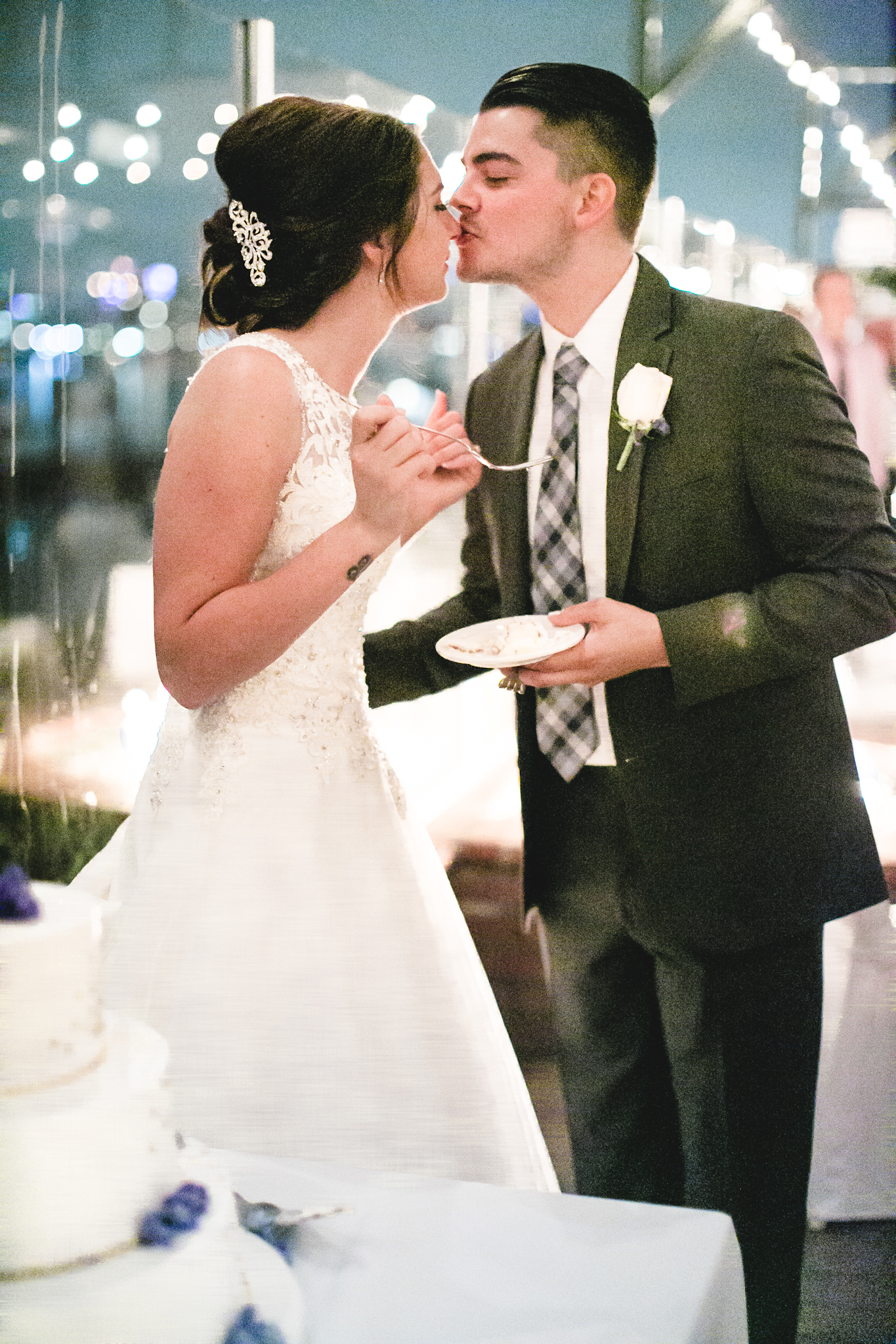 This was an adorable moment. Aaron got just a bit of cake on her nose and kissed it all off :)