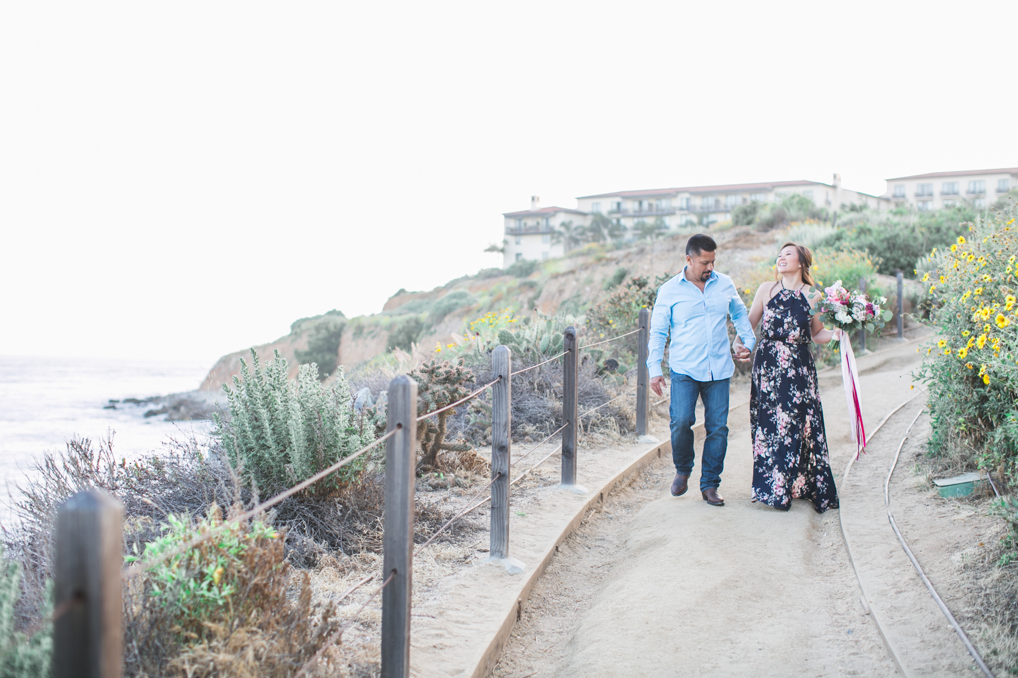 We took the engagement photos at Terranea Cove because of it's natural beauty surroundings and cool Cali-vibe.
