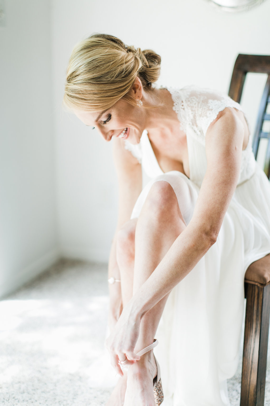 The whole room gasped when she slipped into her BHLDN wedding dress.