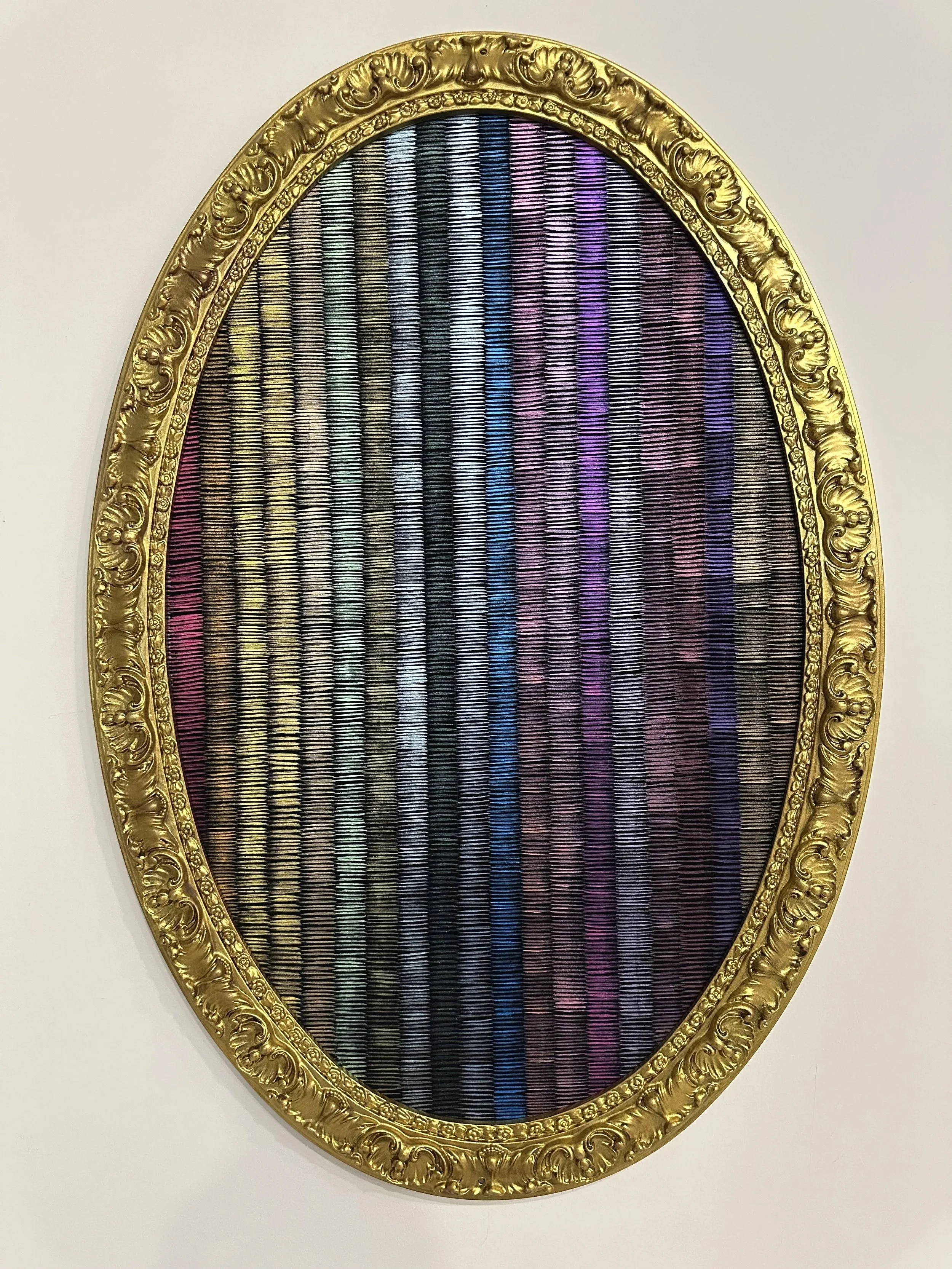 Metalic in an Oval Frame