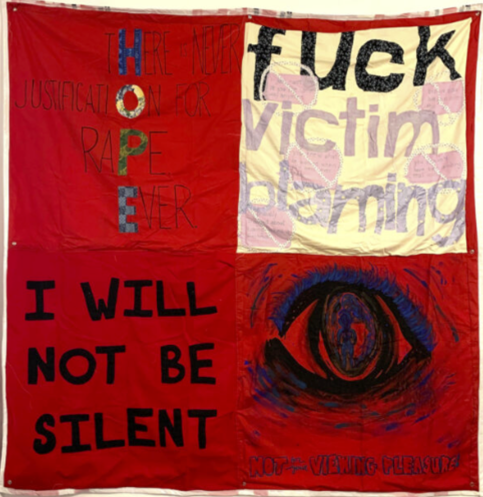 4 red quilt squares with stories sewed on