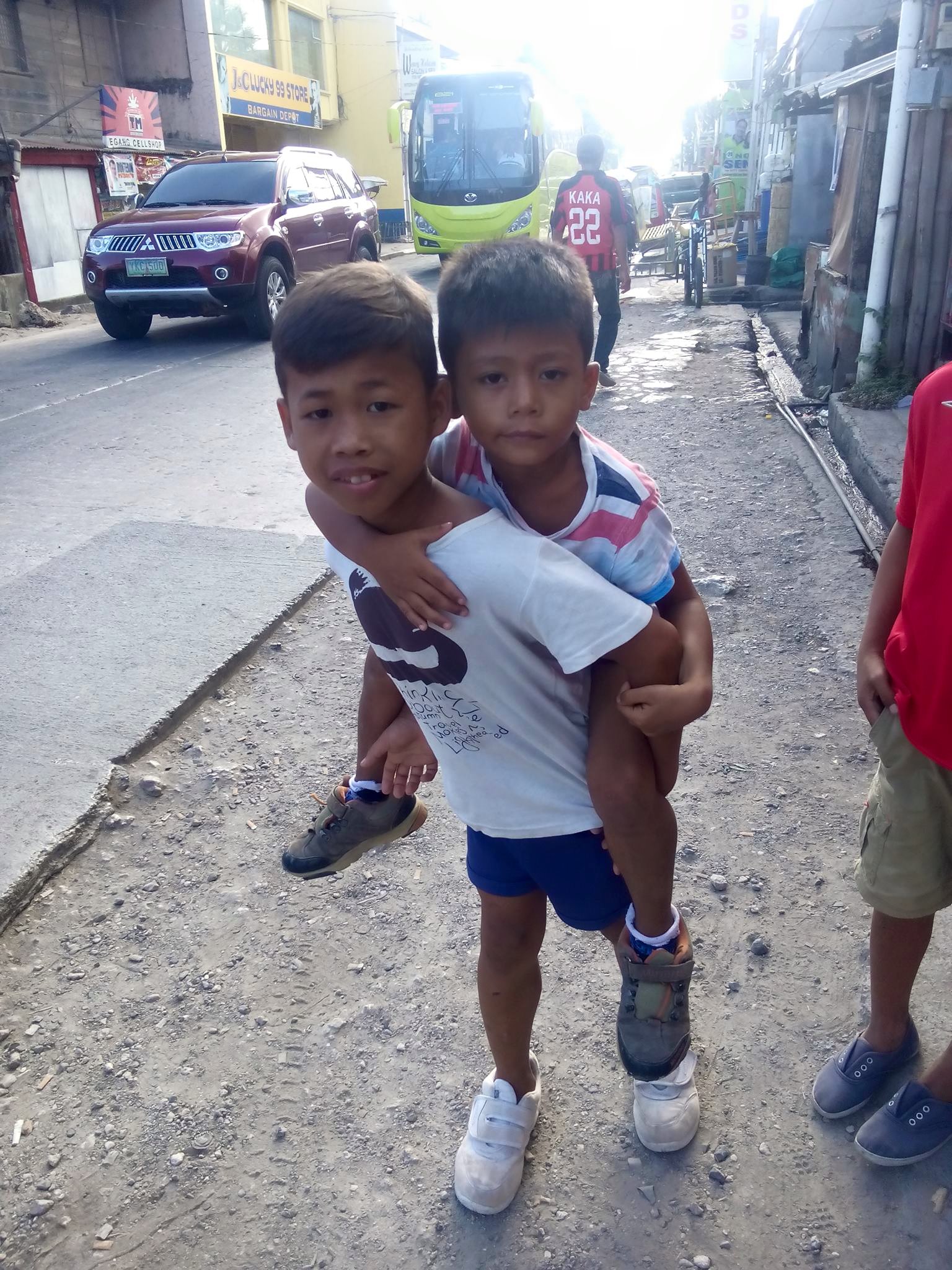 Bernard carried by Rolindo.jpg