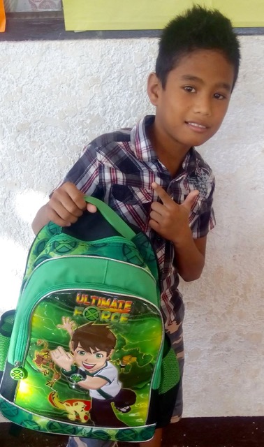 Junior with his book bag May 2016 (2).jpg