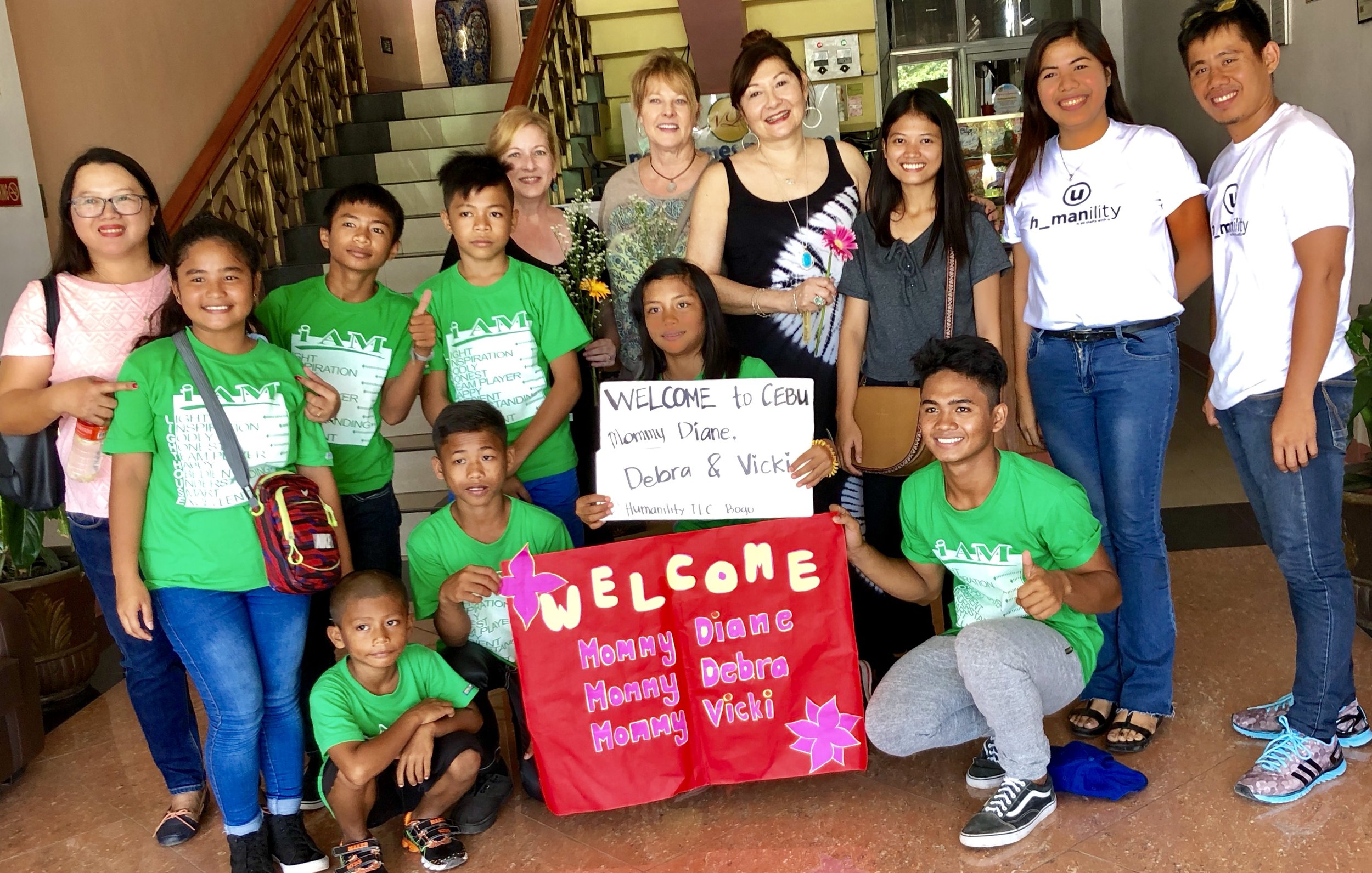 Bogo welcome with Vicky and Debre.jpg