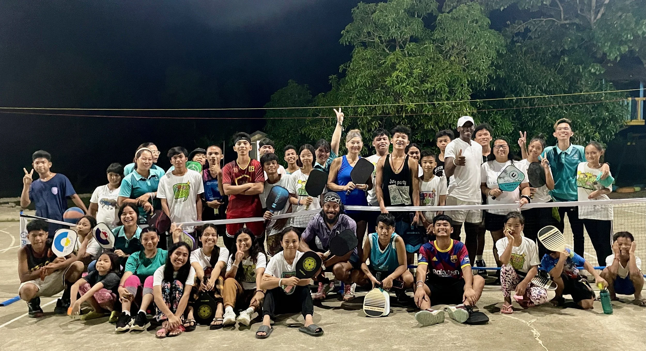 Group pickleball on court.jpeg