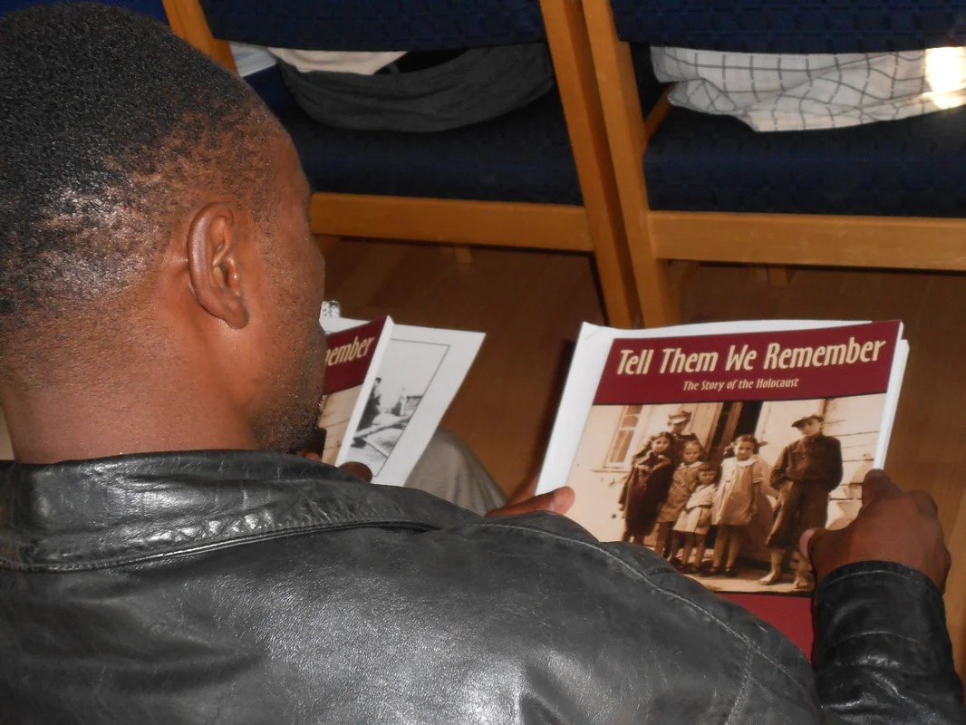 EIHR Kigali 2011-17-Many presenters brought copies of materials to share with the Rwandan teachers, including this book from USHMM.jpg