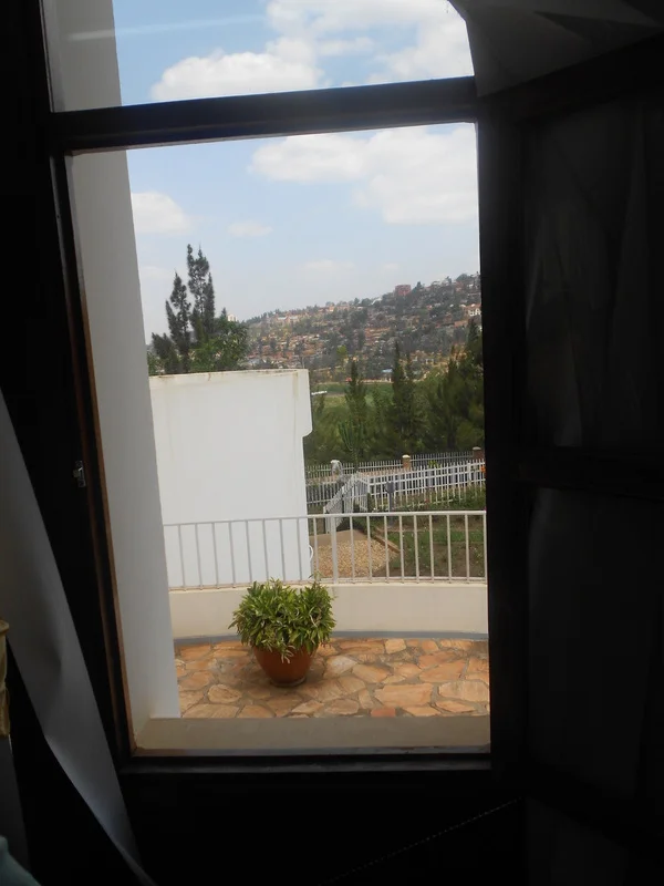 EIHR Kigali 2011-31-beautiful view looking out of the conference room into the Memorial Centre's gardens looking out at Kigali.jpg