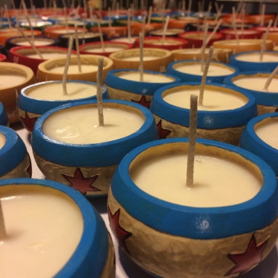 We poured our popular soy candle wax into Fair Trade Made gourds with Chicago Flag inspired design that were hand-carved, hand-painted, and pyrographed in Peru.