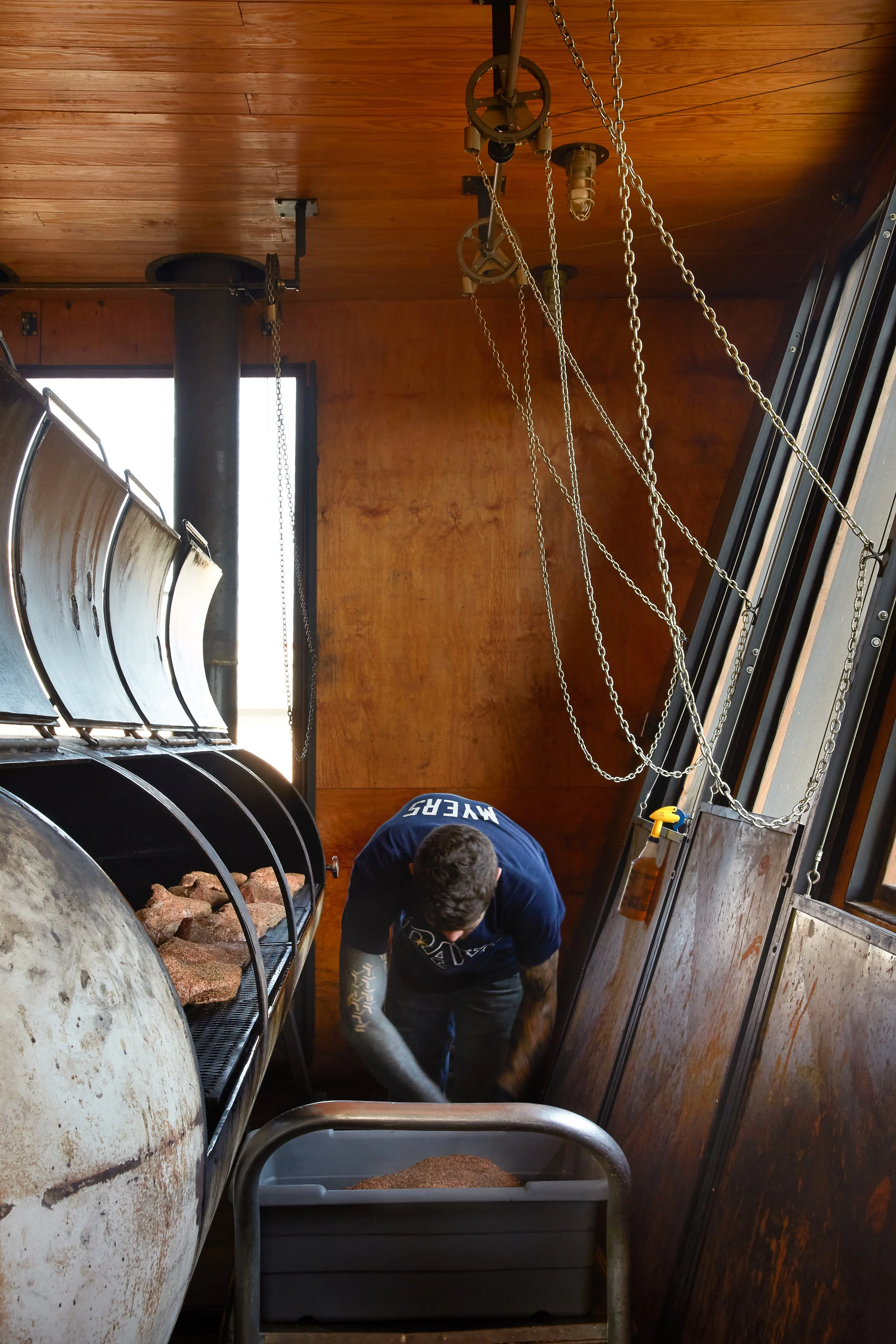 17_Motherbuilt_Franklin_Kirk_Loading_Smoker copy.jpg