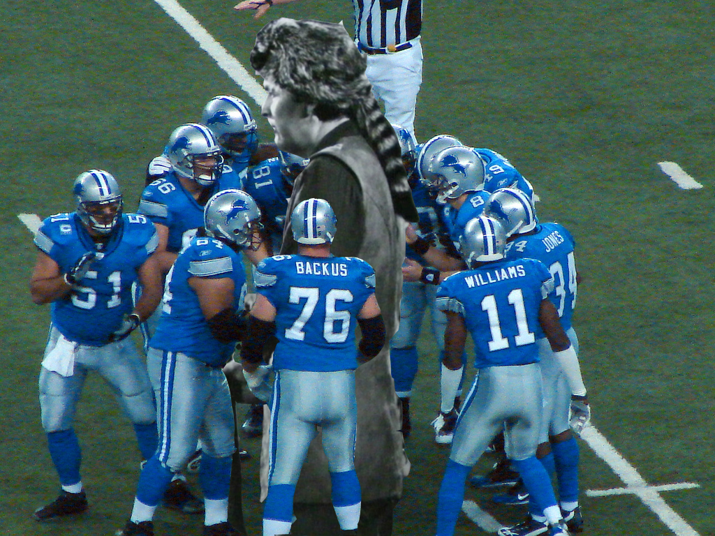 DANIEL AND THE LIONS' DEN: daniel boone, played by fess parker, in the huddle of the detroit lions