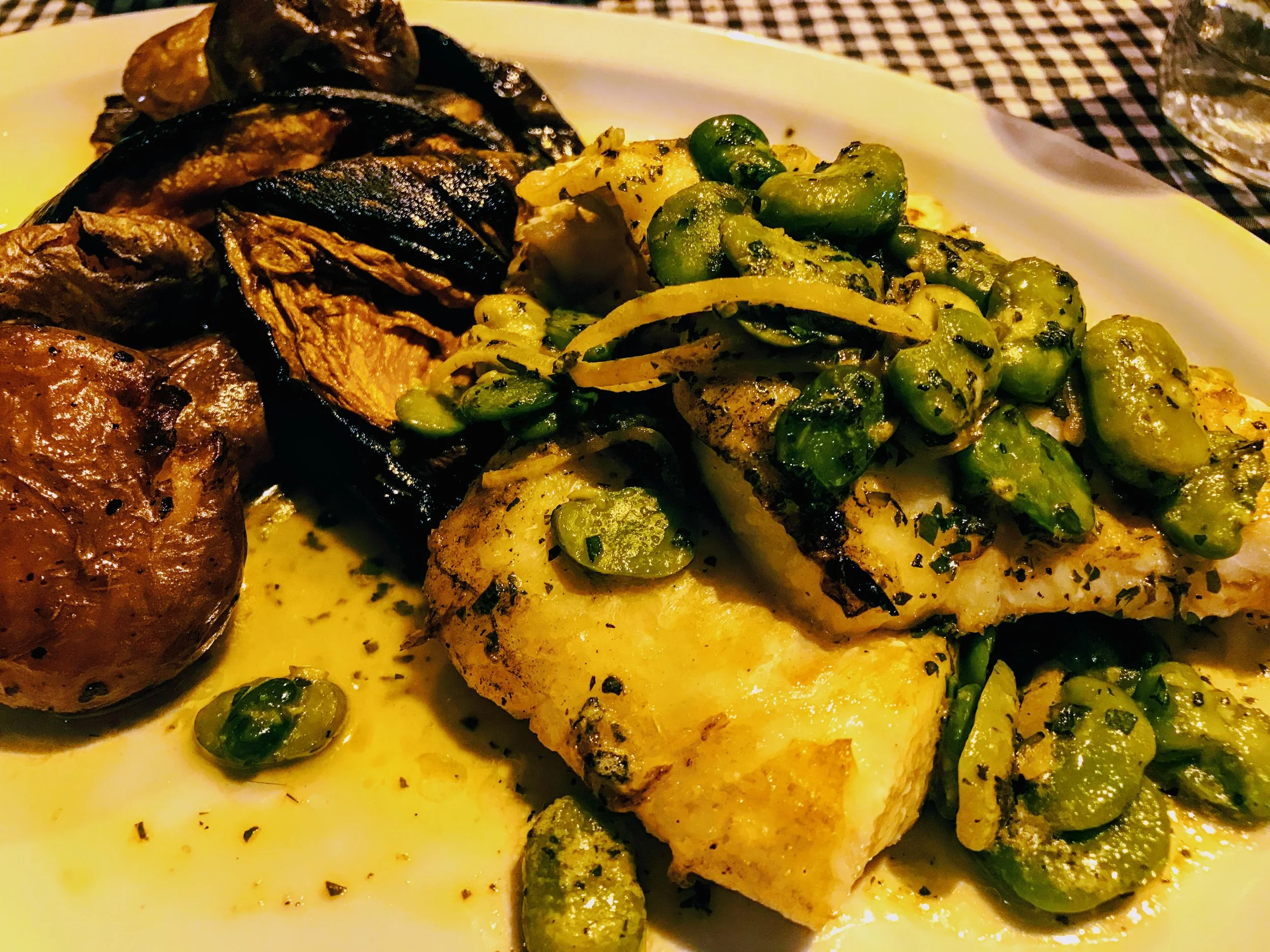 Grilled fish in peas and grilled veggies