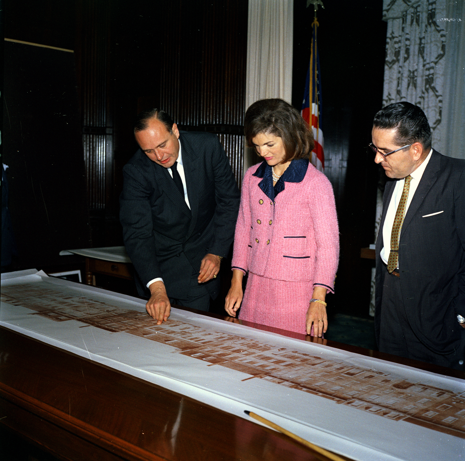 Jacqueline Kennedy reviews architectural elevations of the Renwick Gallery, John F. Kennedy Presidential Library