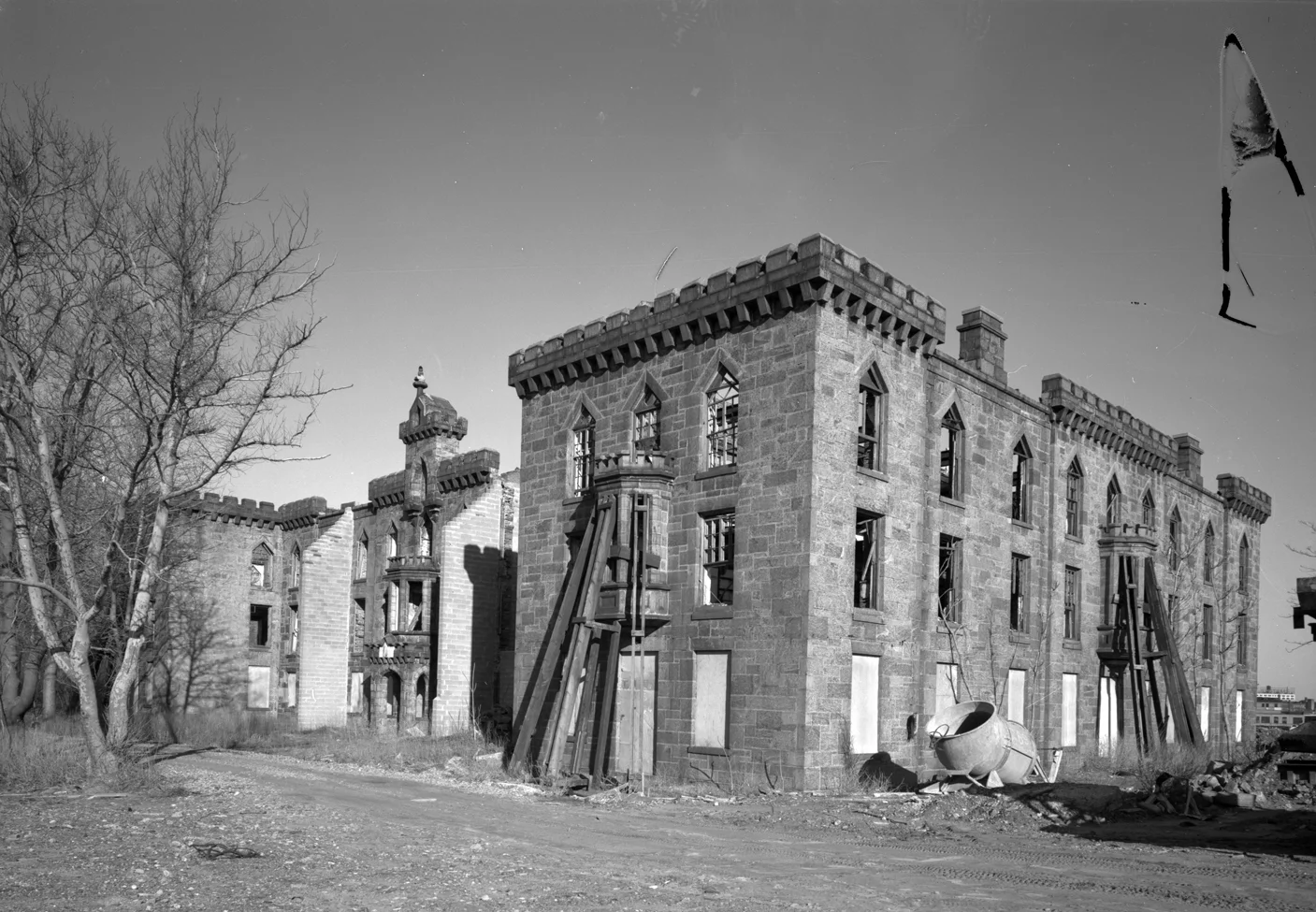 Two bay windows supported by large timbers, New York City Landmarks Preservation Commission