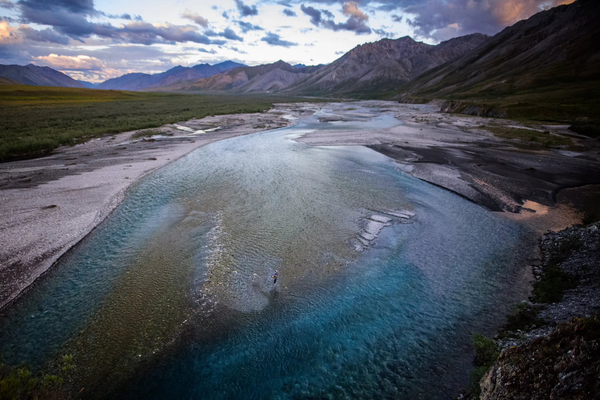 Brooks Range, Alaska “While photographing an eight day float hunt for caribou, I got my first taste of Alaska in its most beautiful corner (and by corner, I mean 19,286,722 acres in the Arctic National Wildlife Refuge). When not glassing for caribou, we enjoyed purple peaks, lush, green tundra, 20 hours of daylight and hungry Dollies.” - Paul Kemper