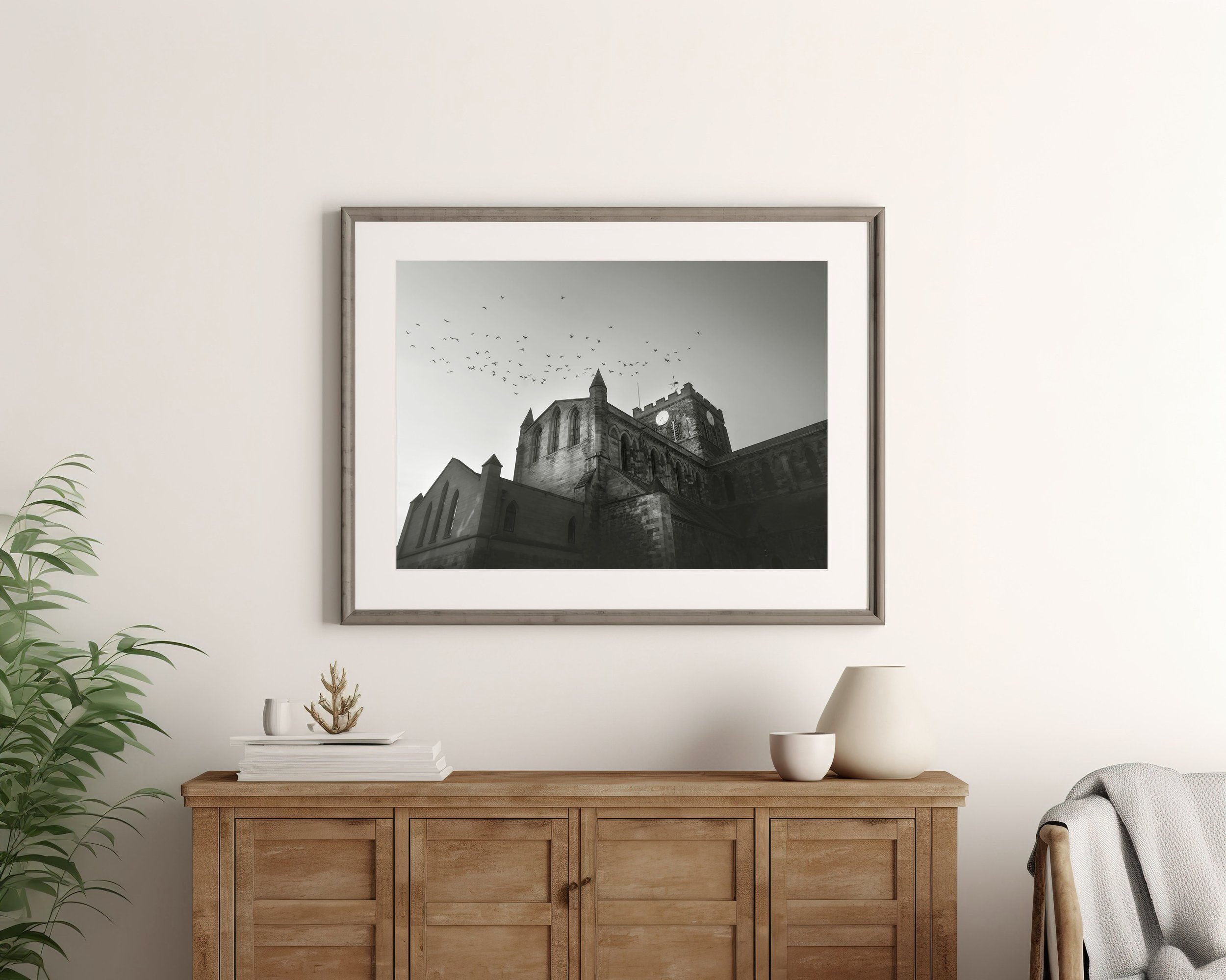 Framed fine art giclee Northumberland landscape print hanging on the wall