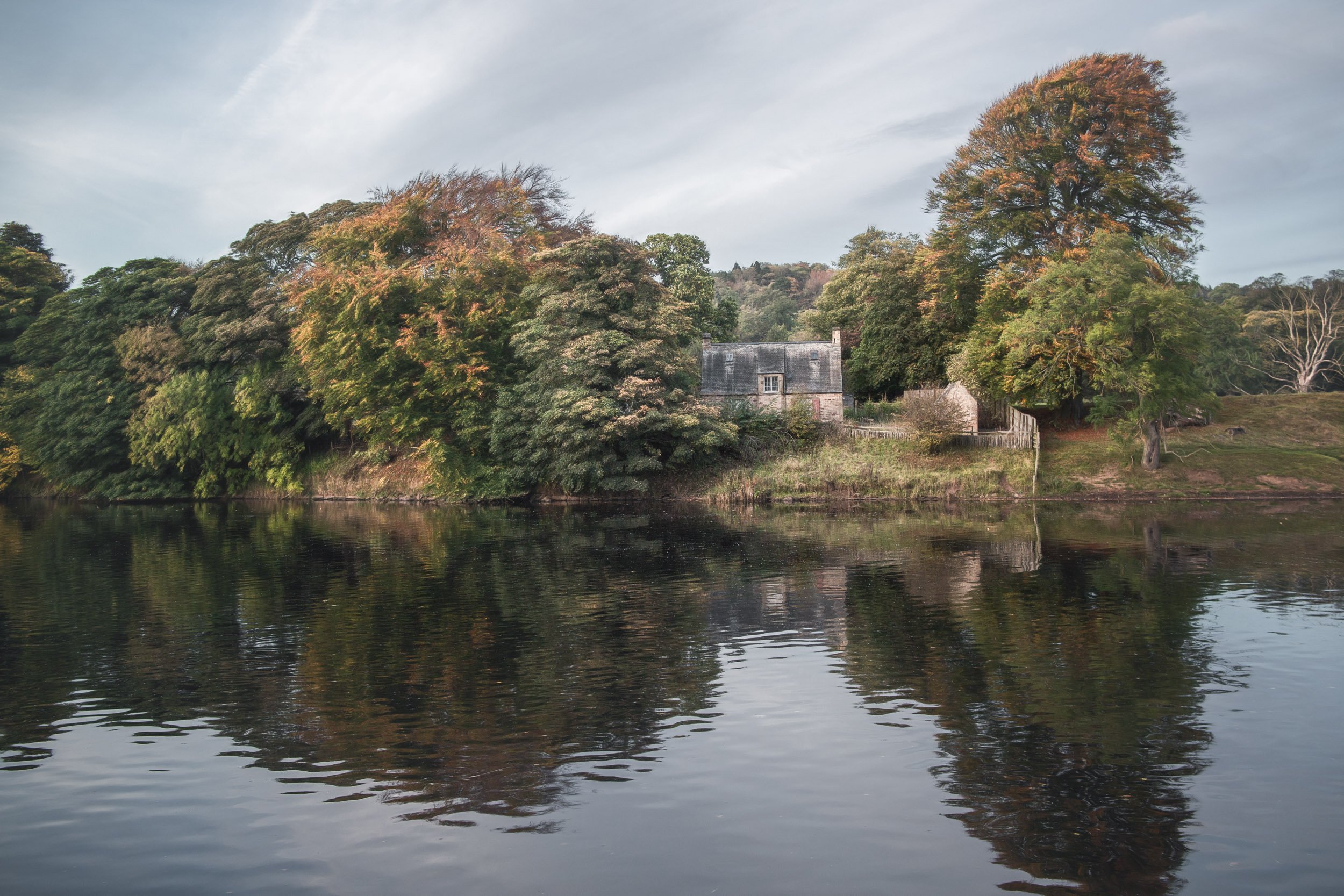 fine art landscape photograph of a cottage on the river tyne in hexham northumberland