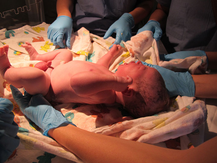 I felt immediate relief, pure bliss, and a wonderful sense of the power inside my own body that had taken over. Holding Gray and snuggling him to my chest for the first time was the most amazing feeling I've ever experienced. Matt and I both were crying with joy and the profound sense of love for our new little family. 
