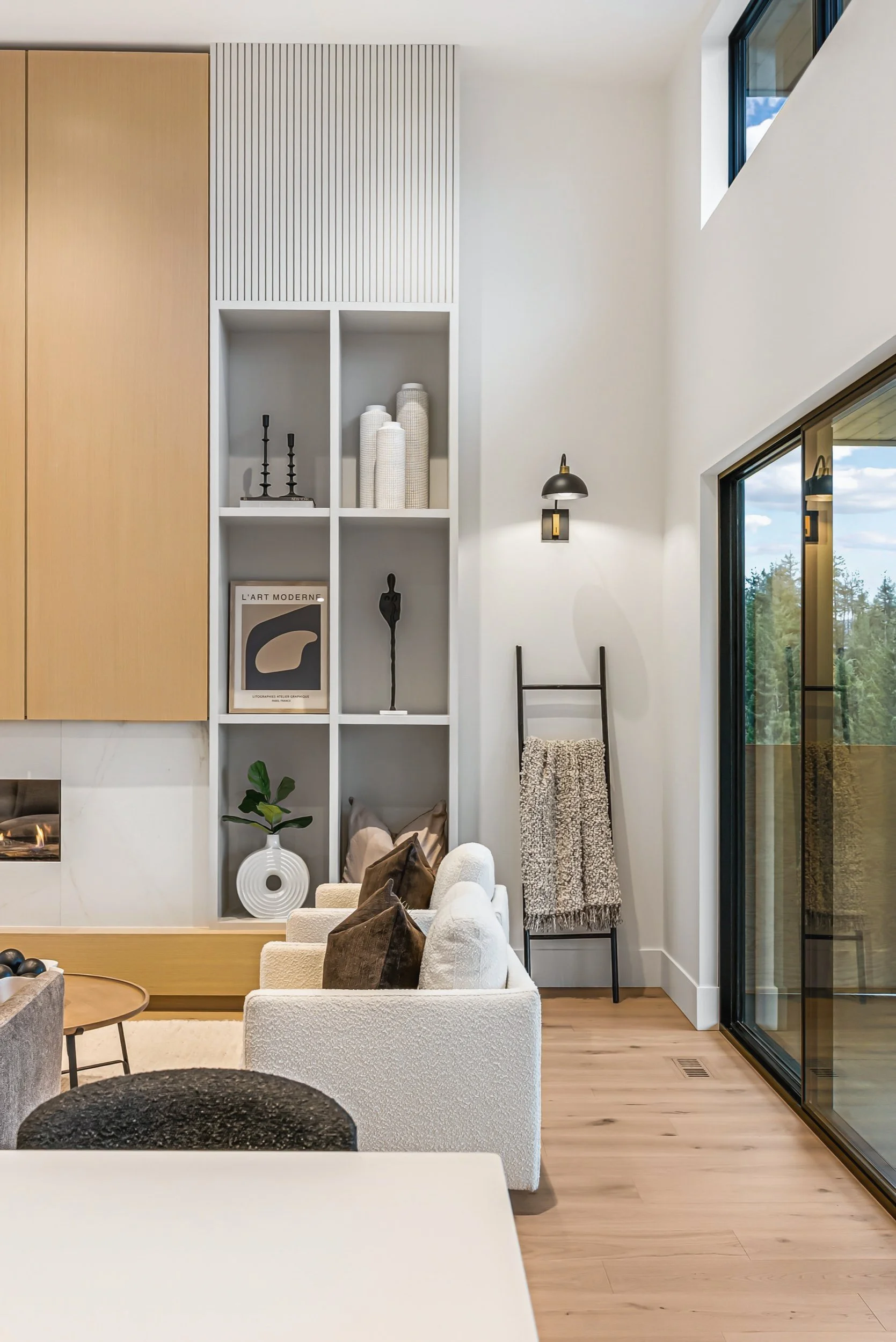 Open white shelving beside the oak wall, with a sliding door to the deck, Ellison Walkout, Predator Ridge