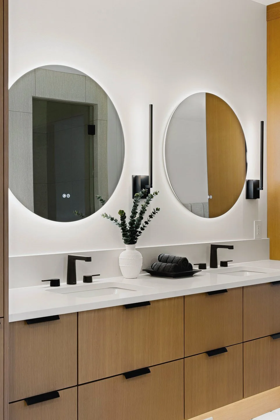 Double vanity with round backlit mirrors and oak drawers, Fairway Rancher, Predator Ridge