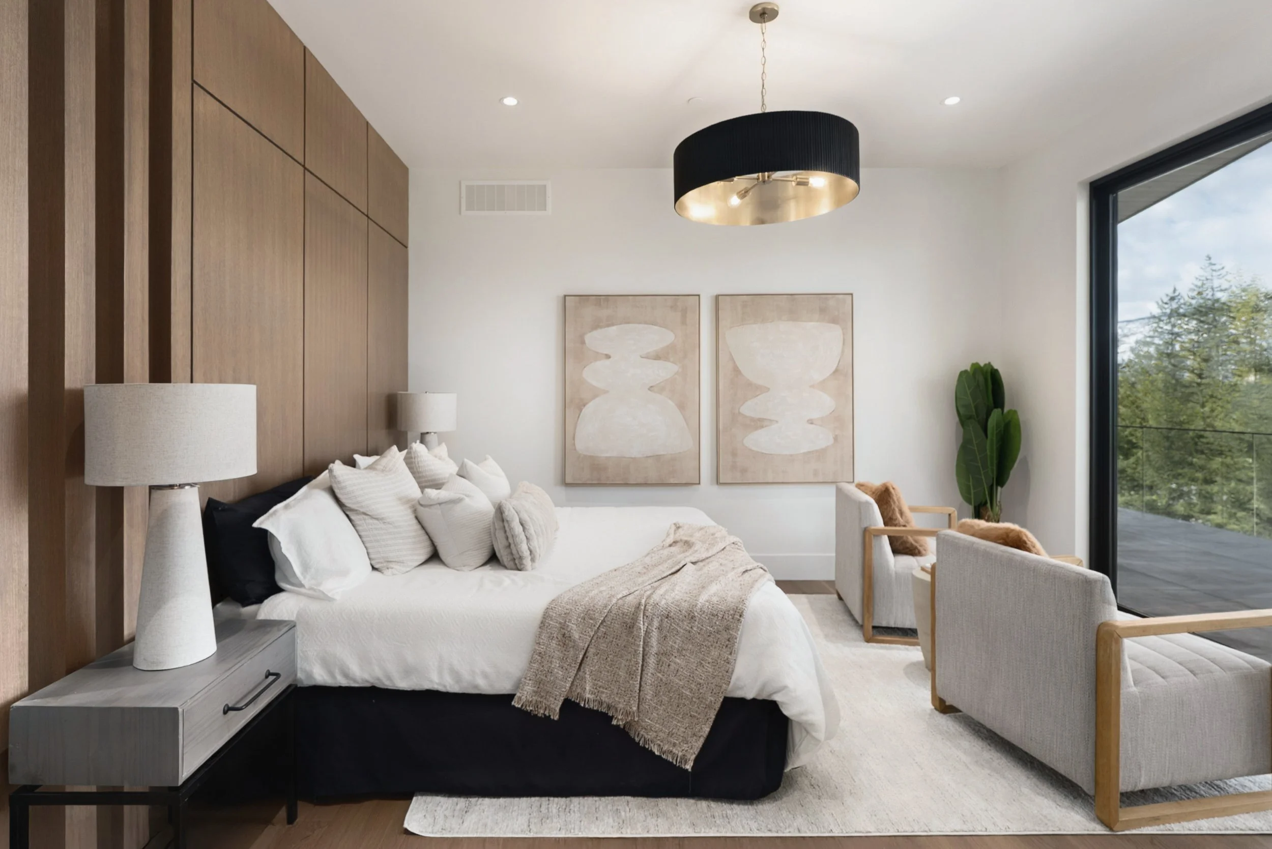 Primary bedroom with a wood slat wall and drum pendant, Terrace House, Predator Ridge