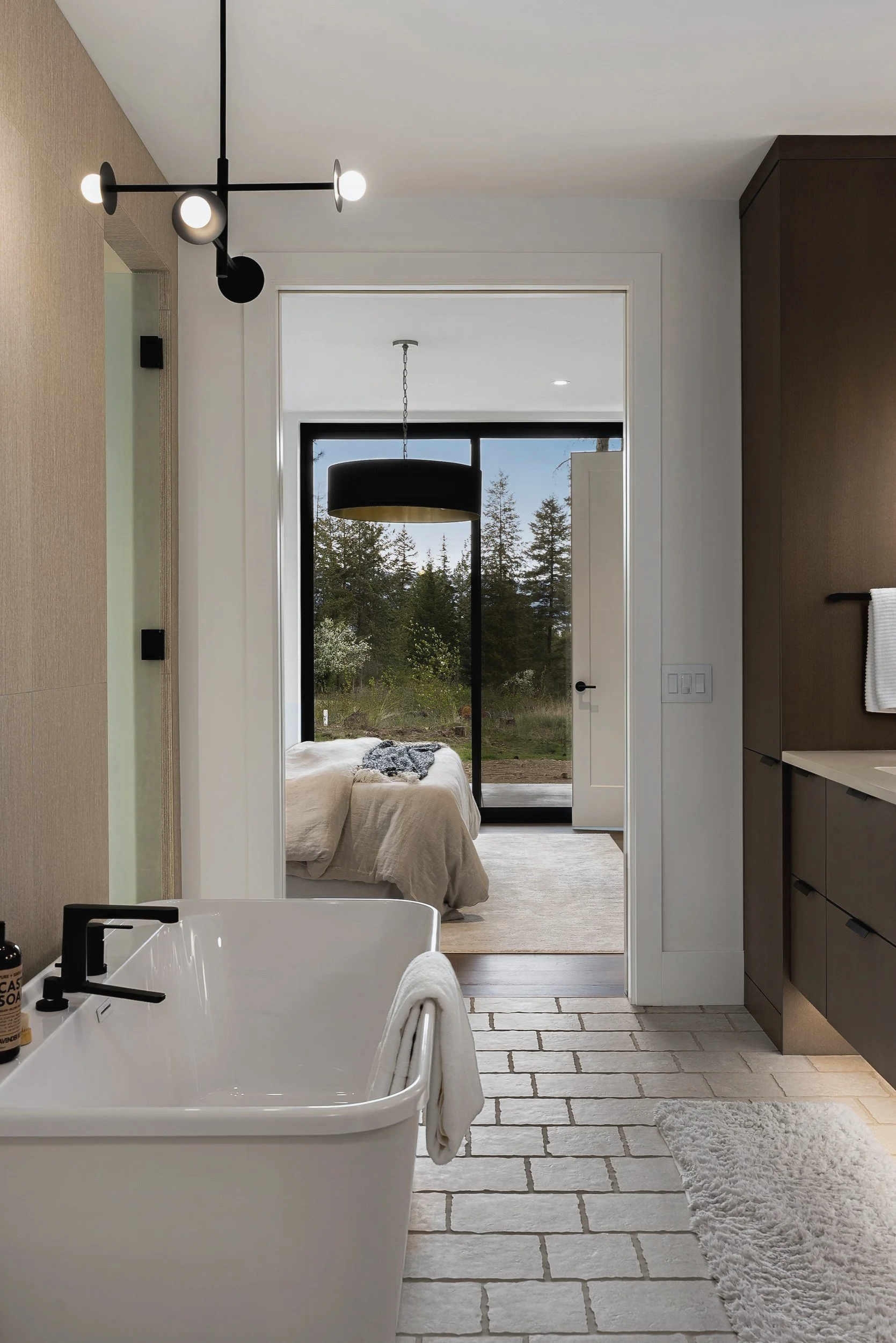 Freestanding tub in the ensuite, looking back to the bedroom, Green View Residence, Predator Ridge