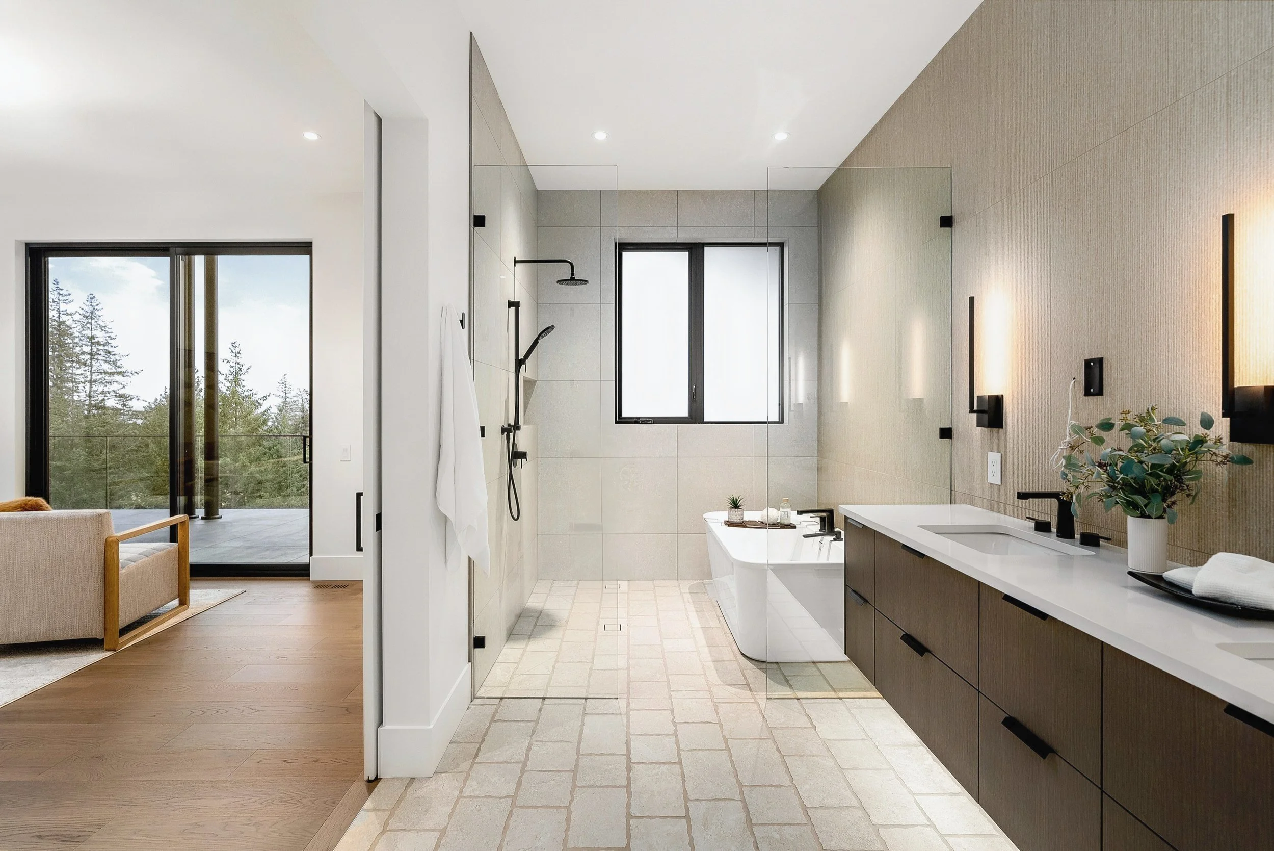 Primary ensuite with a freestanding tub and dark wood vanity, Terrace House, Predator Ridge