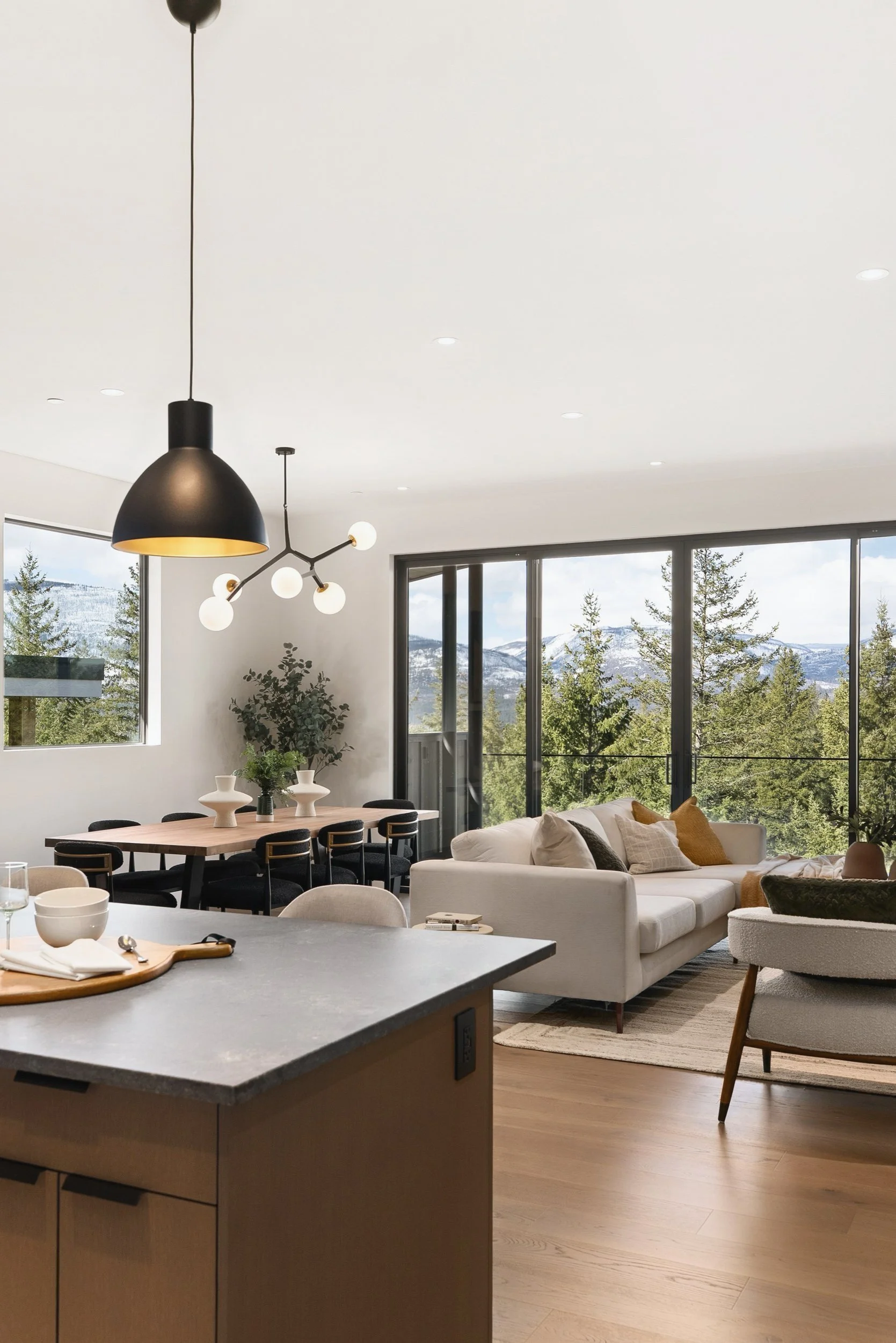 Kitchen island looking toward the living area and the glass, Terrace House, Predator Ridge