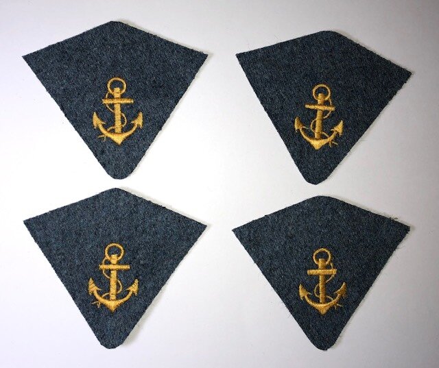 Our insignia that didn’t come in time.