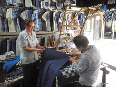 Buying handwoven cotton stripe in Zhujiajiao, China