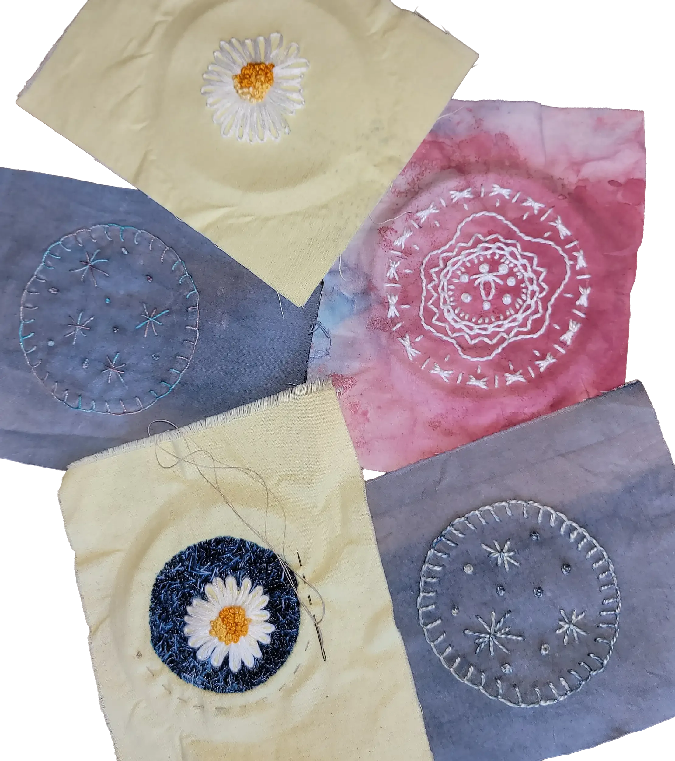 Hand-Stitched Patch Collection: A collection of small mending patches in progress — a daisy shown before and after its dark background was stitched in, two blanket-stitched circles in slate blue-grey with scattered star stitches and French knots, and