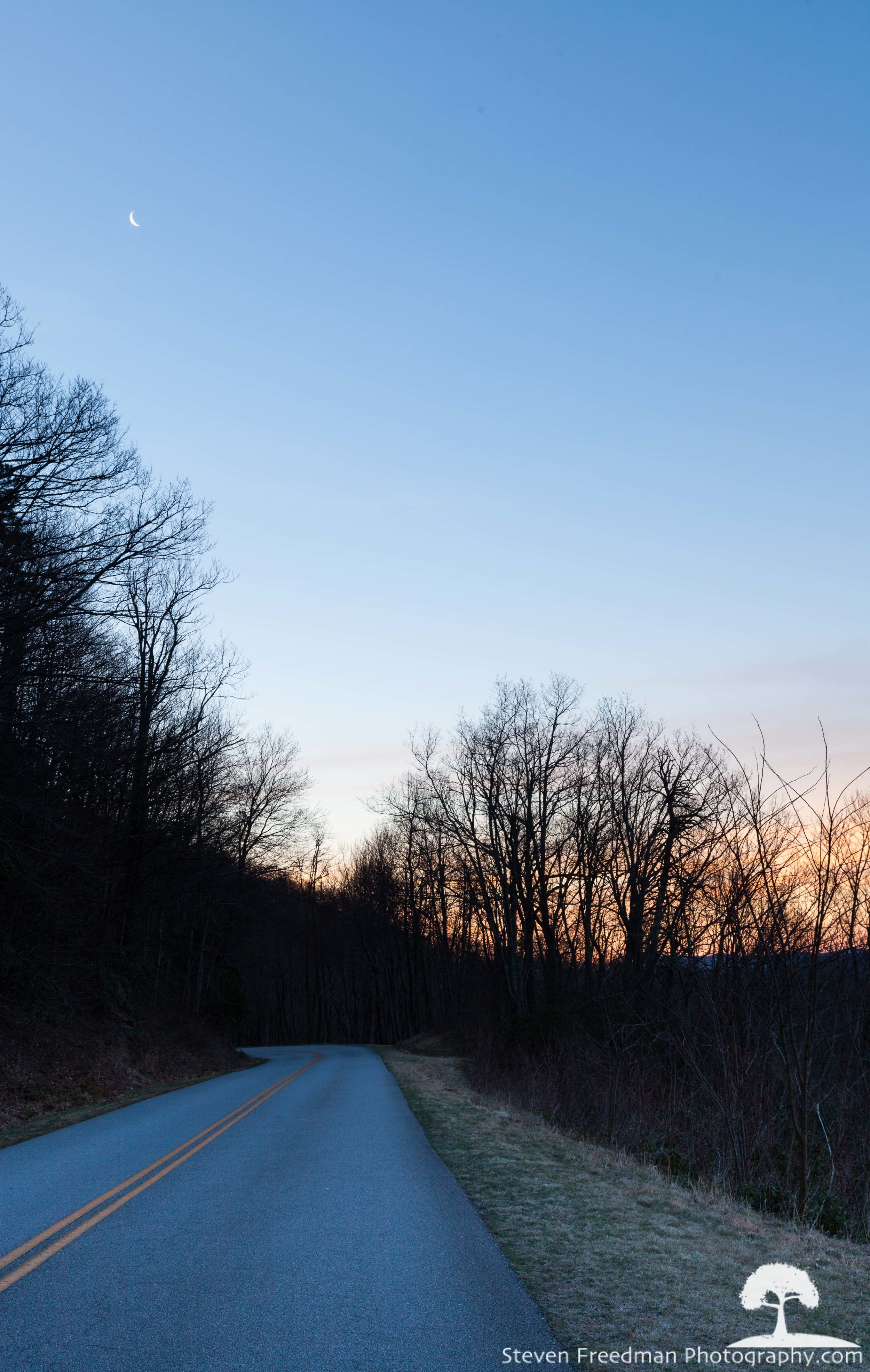  The Crescent moon sets over the Blue Ridge Parkway near Asheville, NC