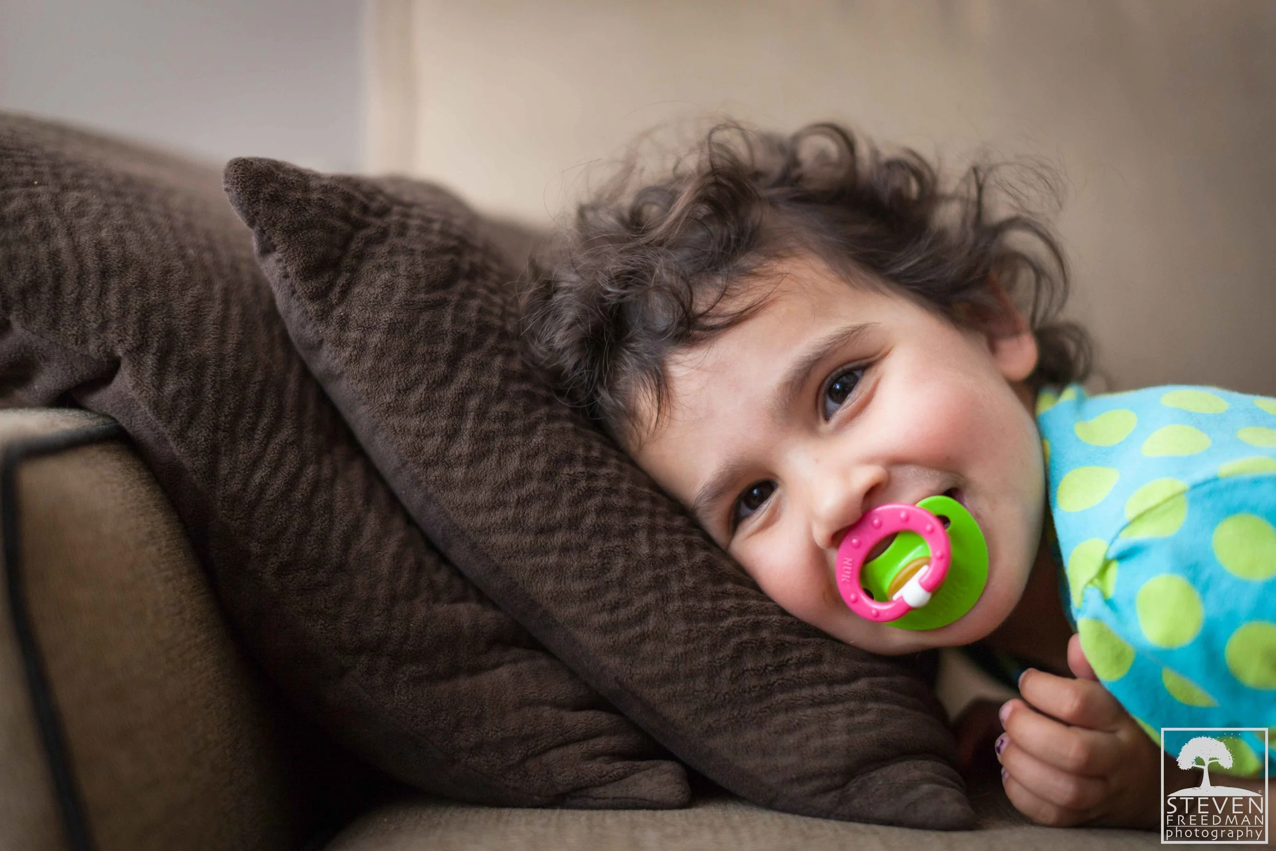 Rosie enjoys extra paci time.