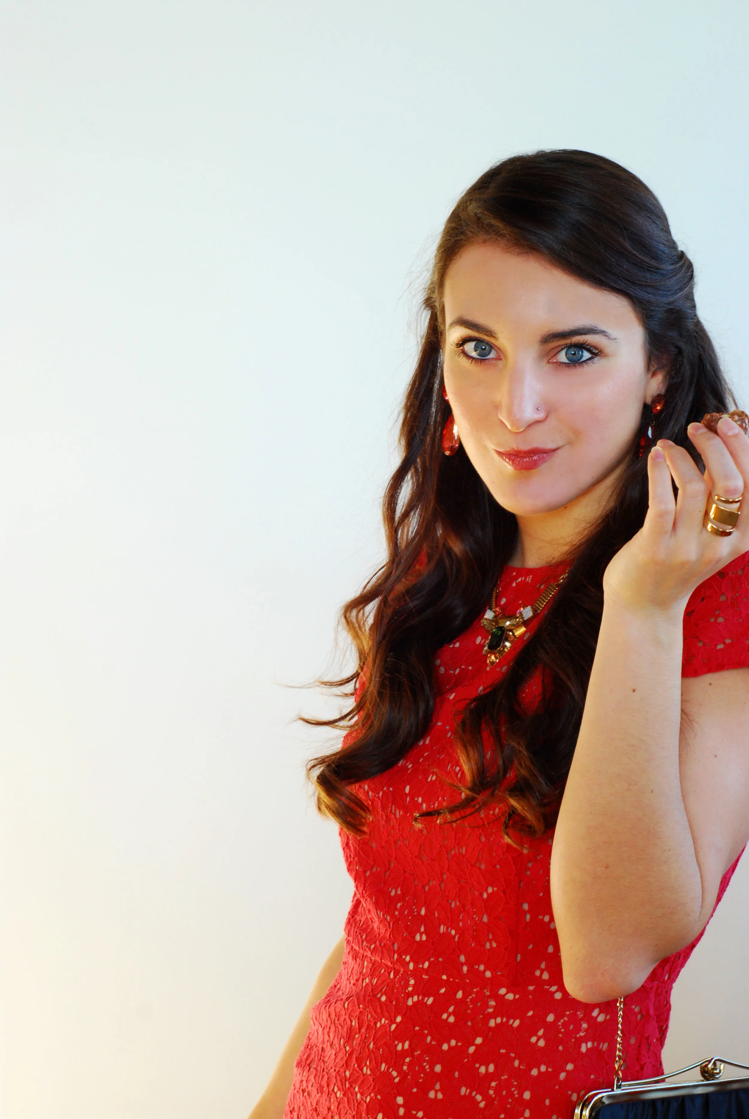  In this post I am eating my favorite chocolate of all time, Ferrero Rocher. &nbsp;This is the perfect dress and outfit for a holiday party.&nbsp;  Wearing:  Dress ll  Loft   Pumps ll  J.Crew   Necklace ll  J.Crew   Ring ll  Top Shop   Clutch ll Vint