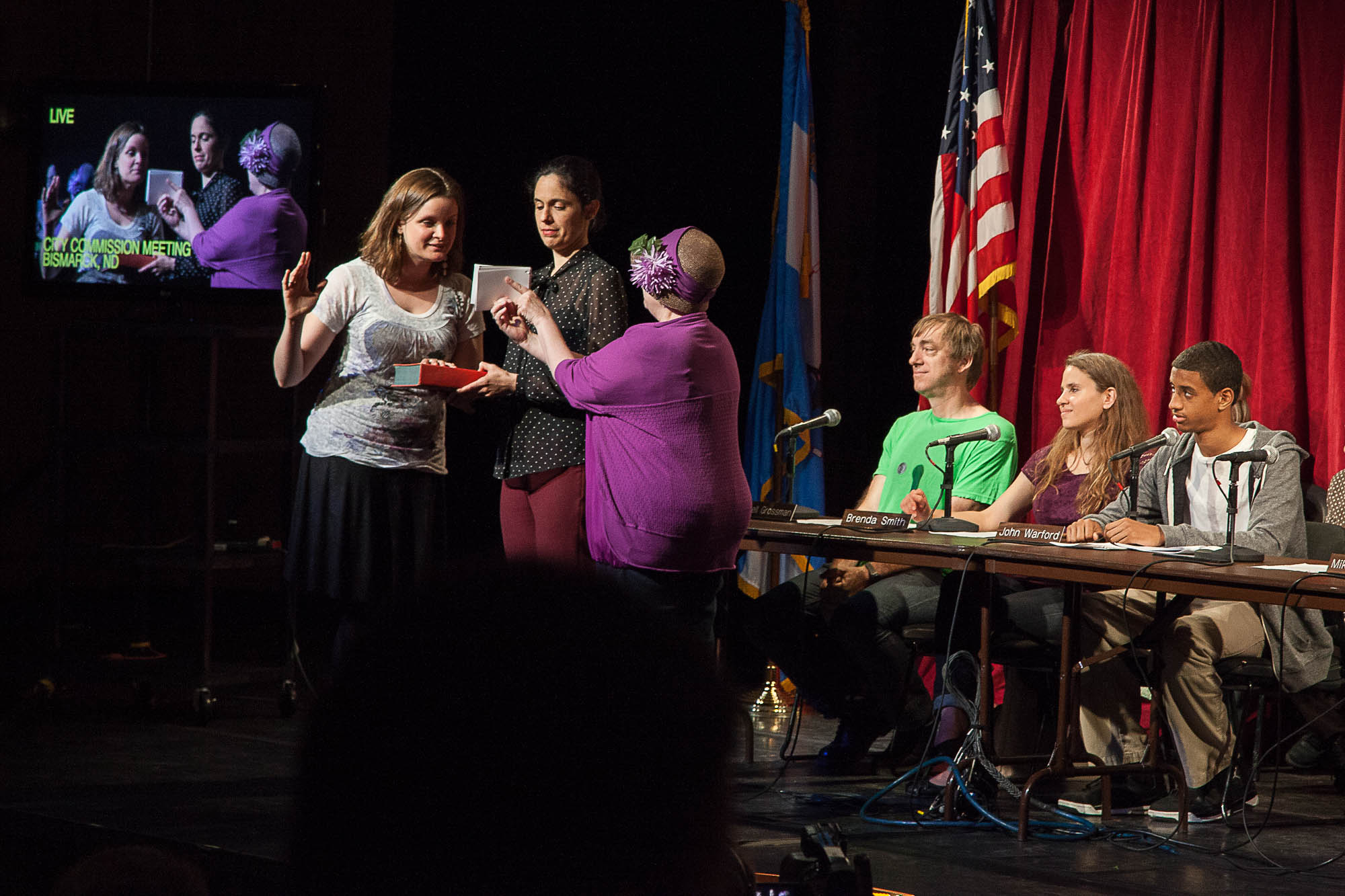 Swearing in during a City Council Meeting at LaGuardia Community College in New York City, May 2013. Credit David Brown and dabfoto creative.