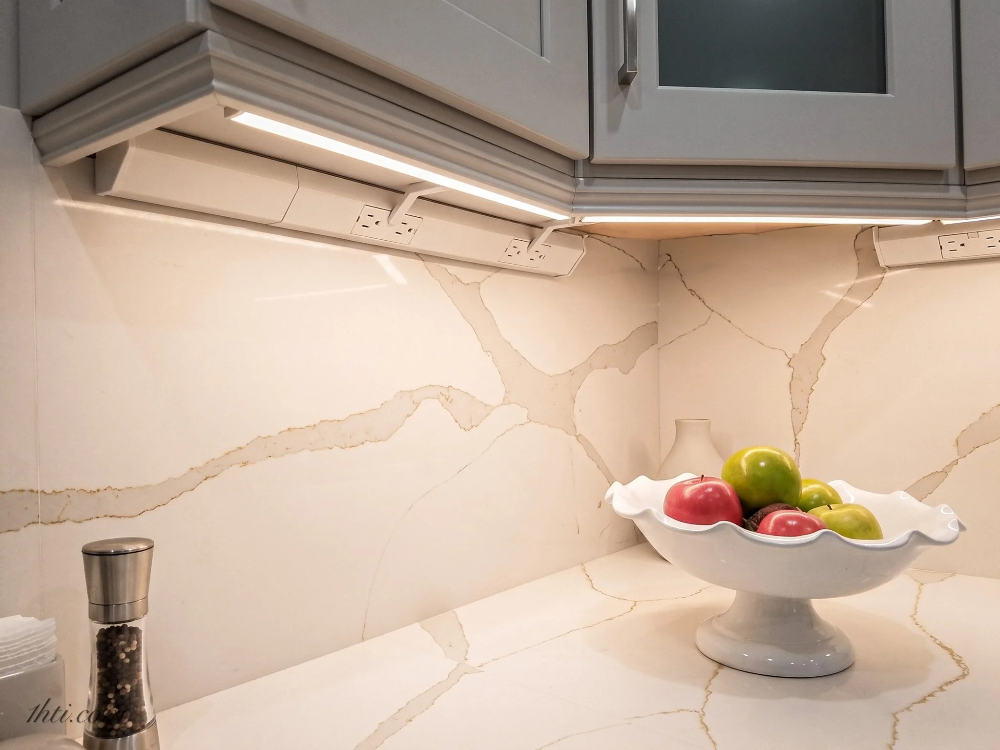 Under cabinet outlets mount to the under side of the cabinets