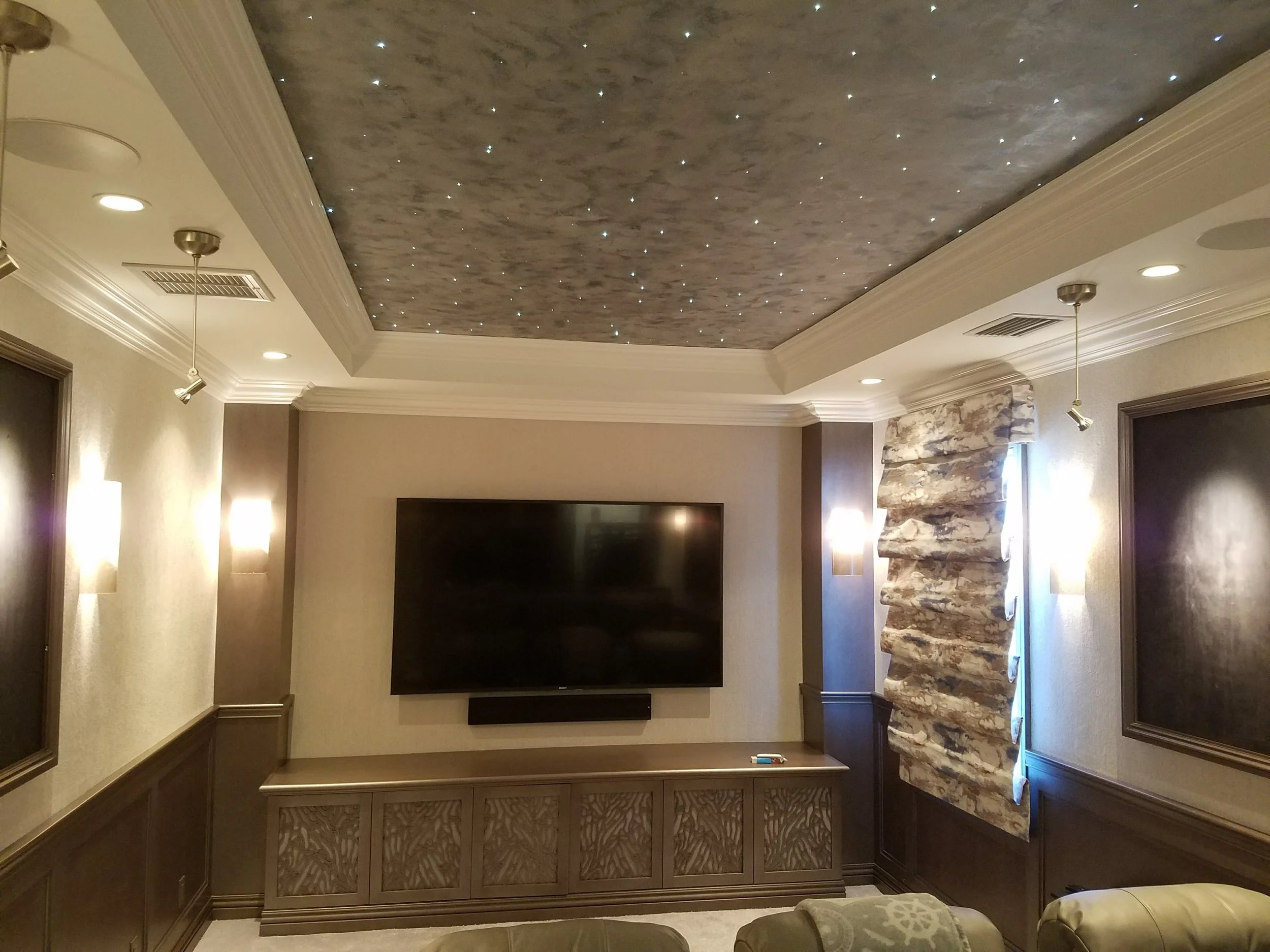 Hundreds of tiny fiber-optic light points in home theater ceilings